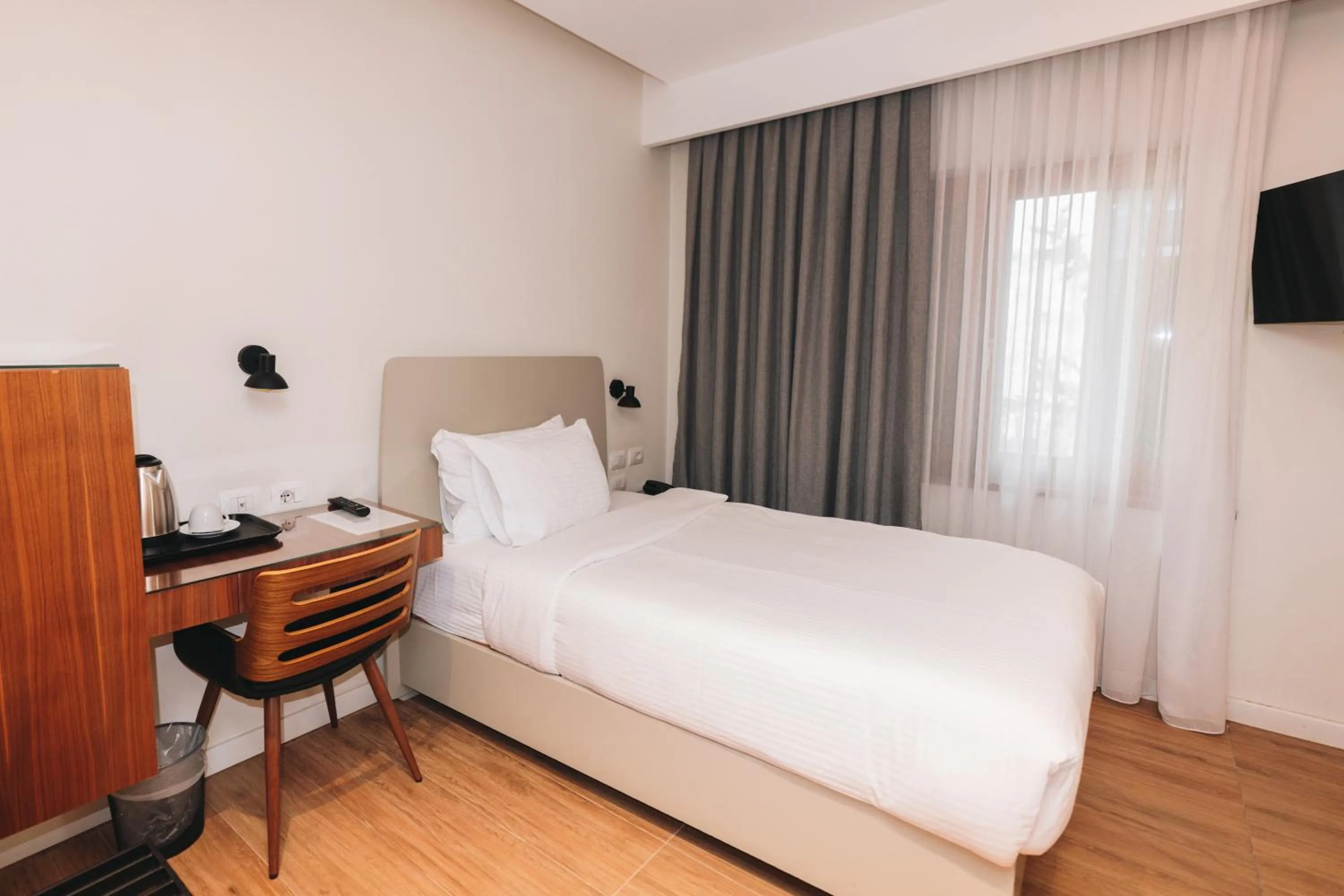 Bed in Hotel Theatro- City Center