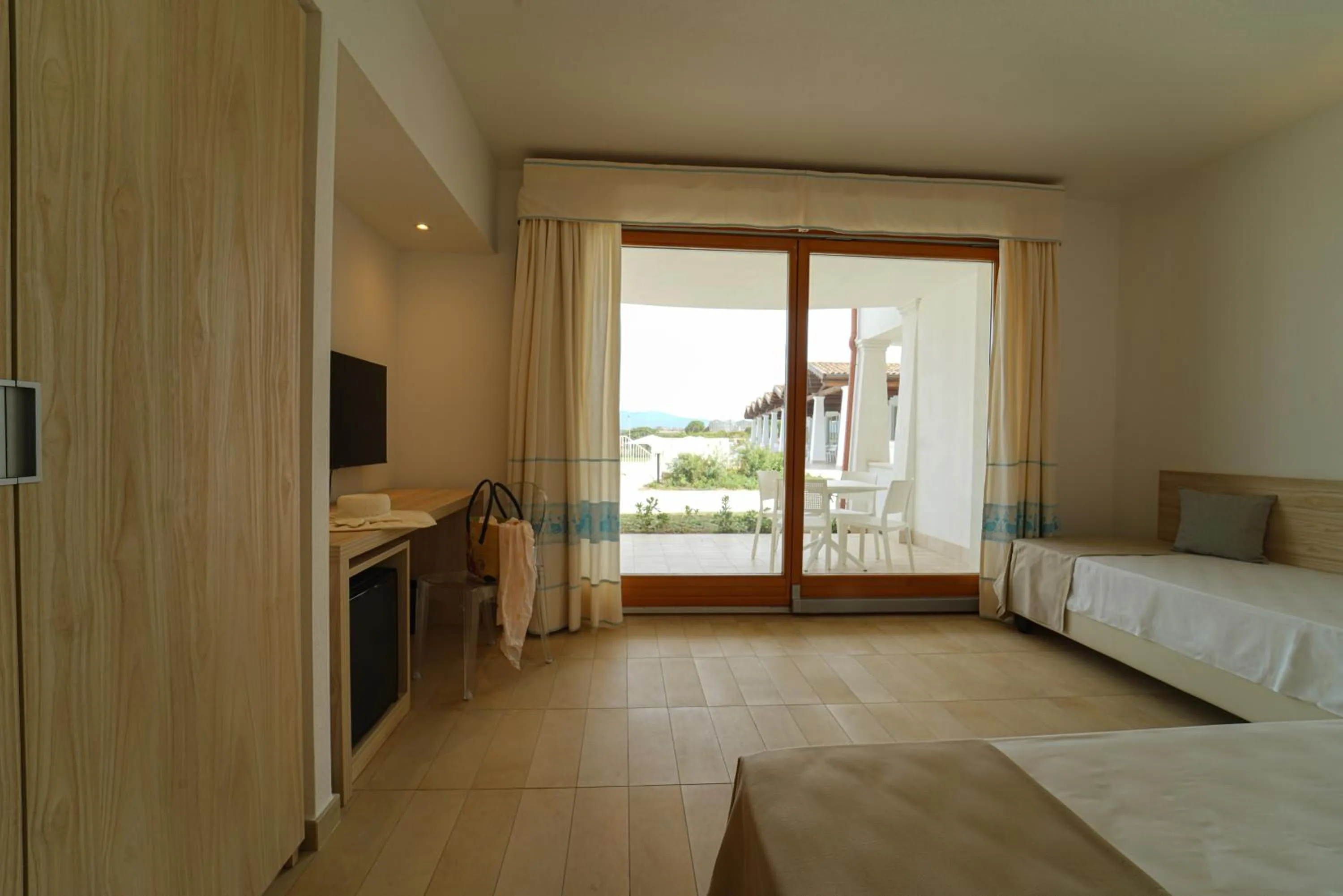 Balcony/Terrace, Bed in GH Santina Resort & SPA