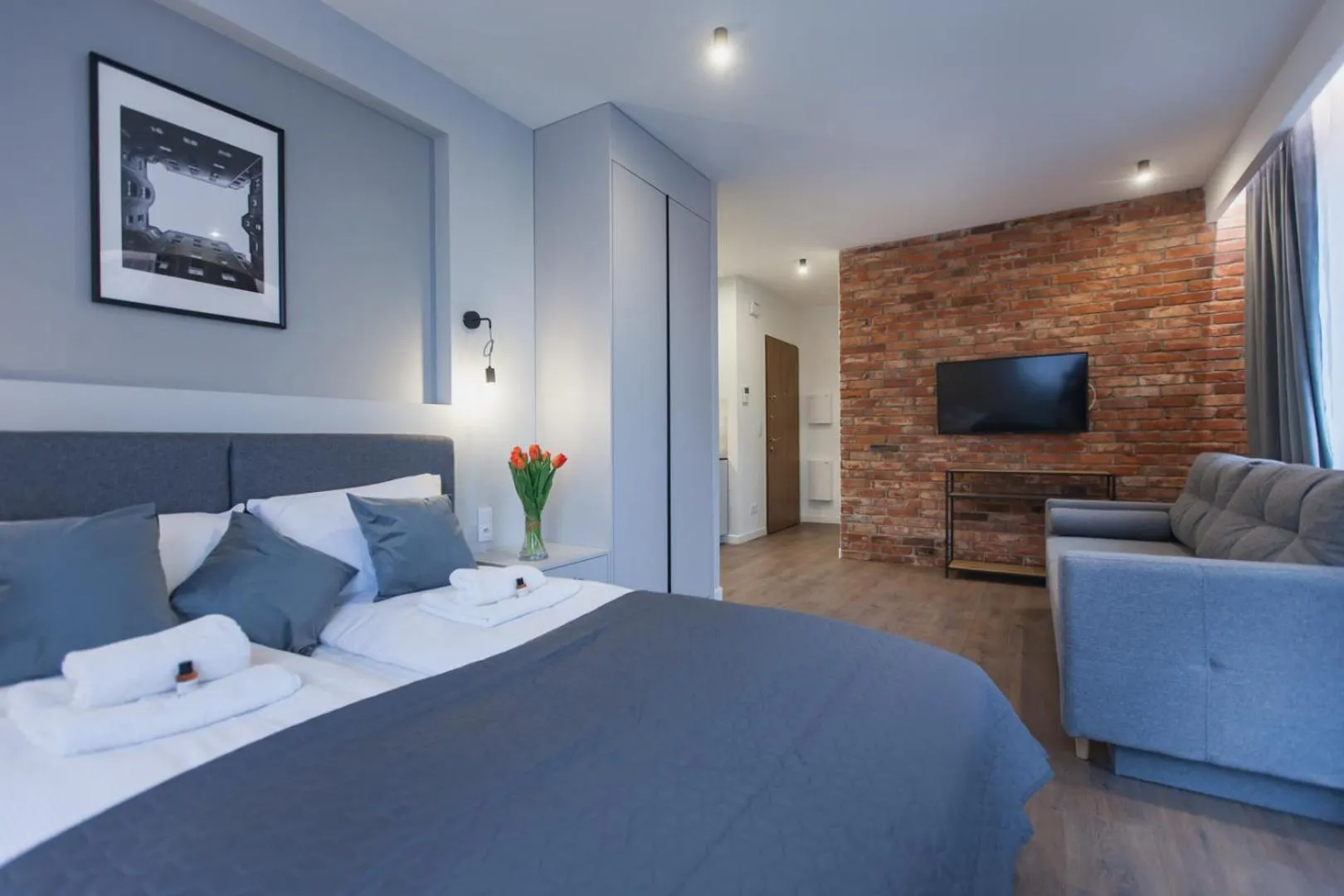 Bed in City Break Atelier Praga Apartamenty