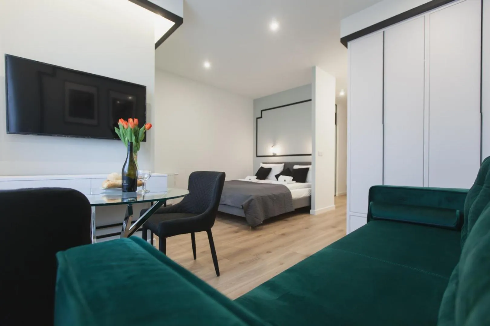 Bed in City Break Atelier Praga Apartamenty