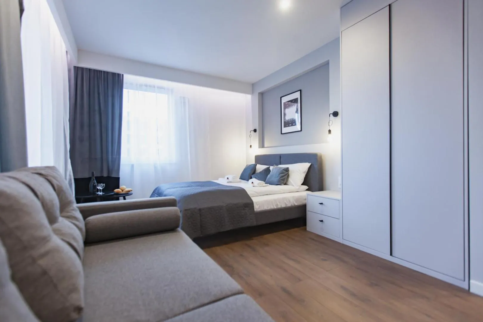 Bed in City Break Atelier Praga Apartamenty