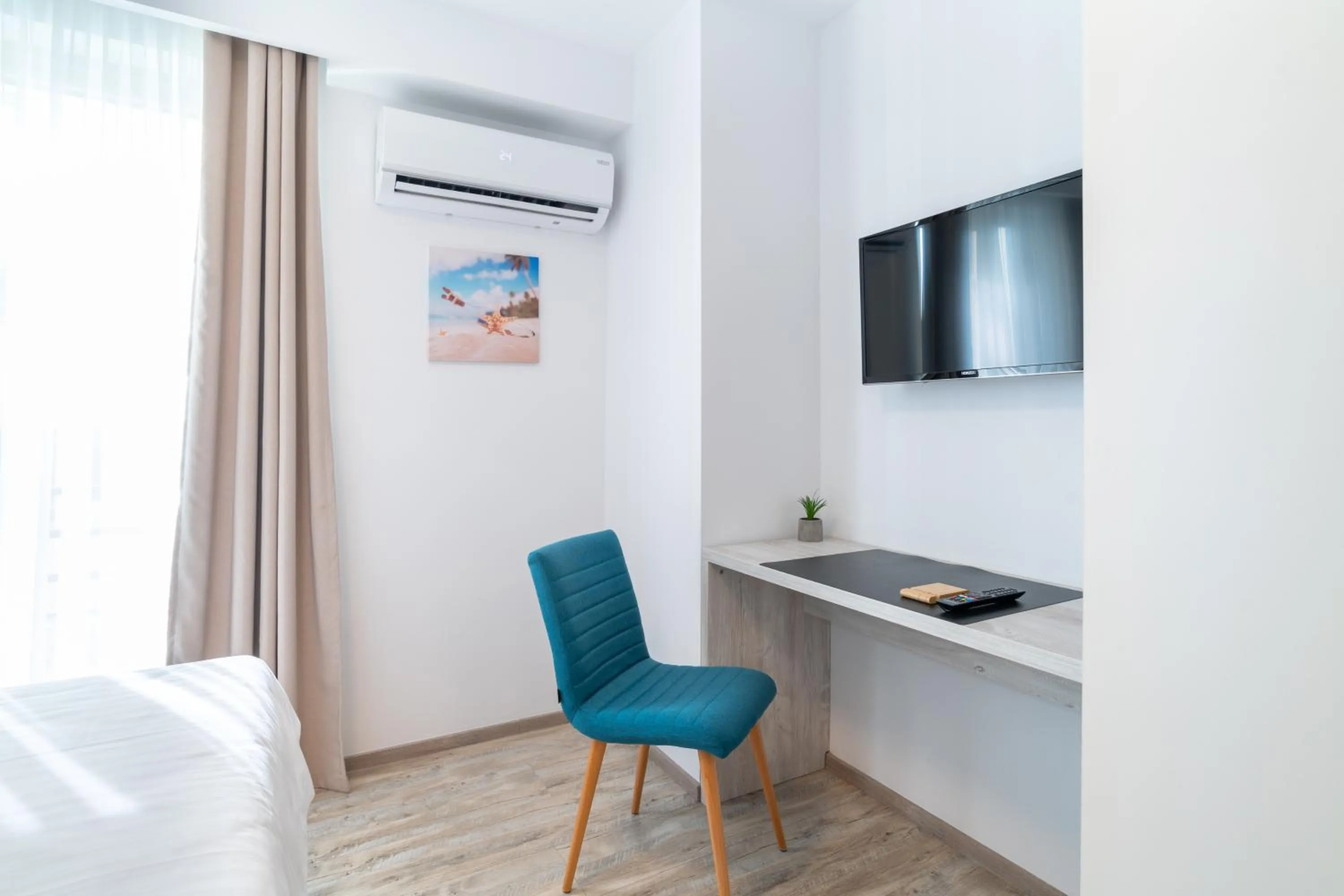 TV and multimedia, Bed in TCI Apartments