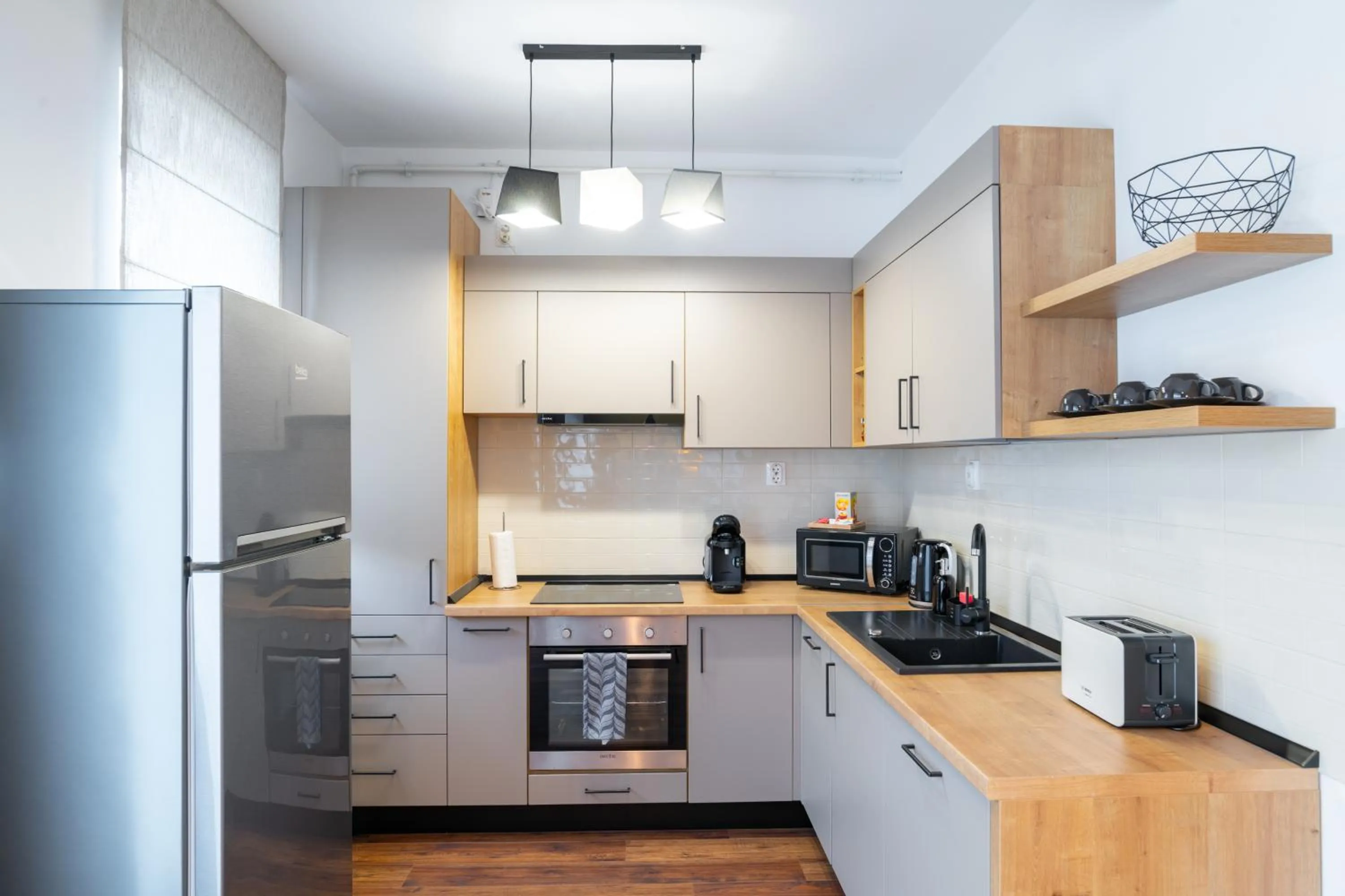 Kitchen or kitchenette in TCI Apartments