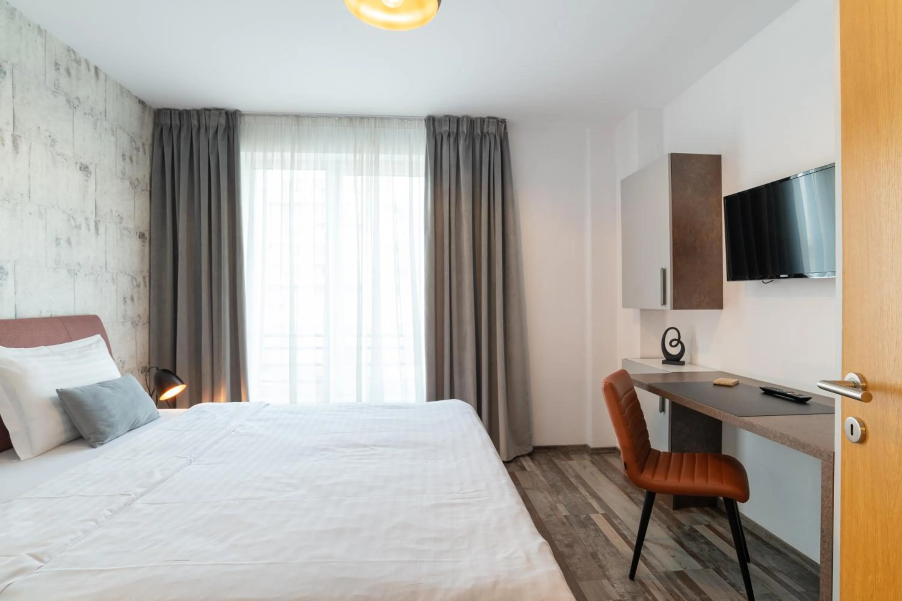 Bathroom, Bed in TCI Apartments