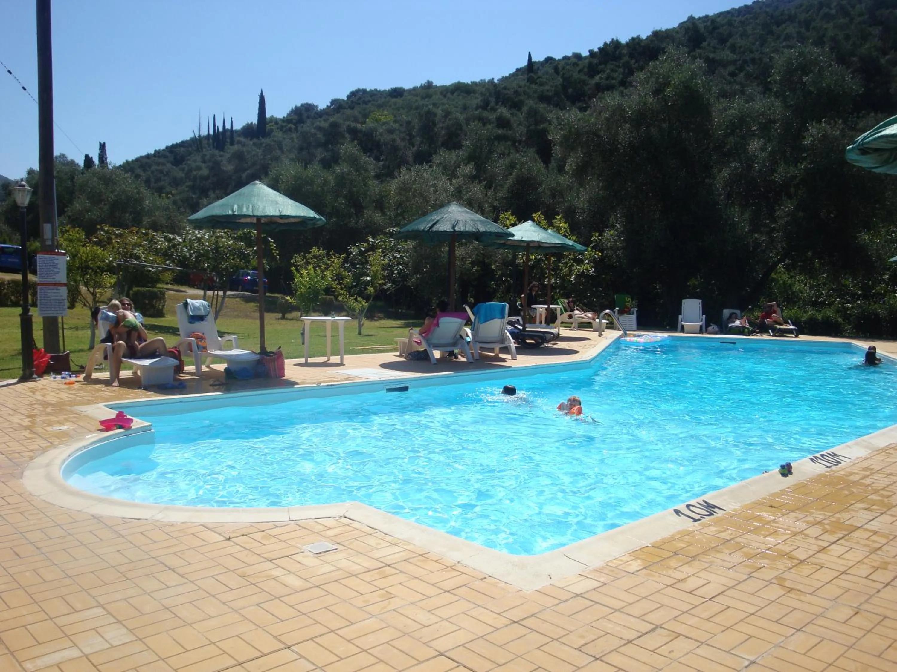 Swimming pool in Donatos Apartments & Studios