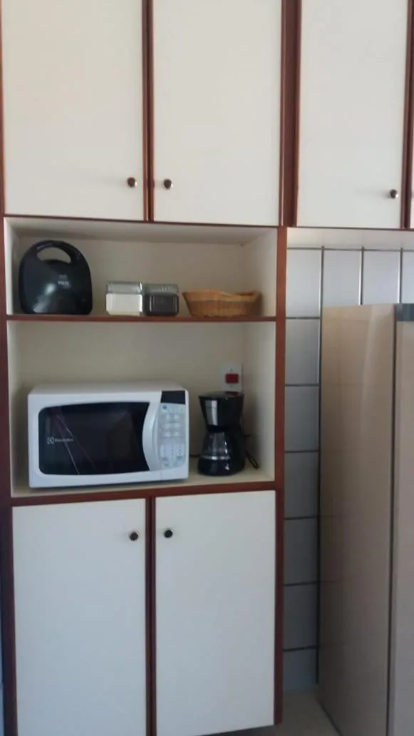 Communal kitchen in Apartamento Mundi - Império Romano - Caldas Novas