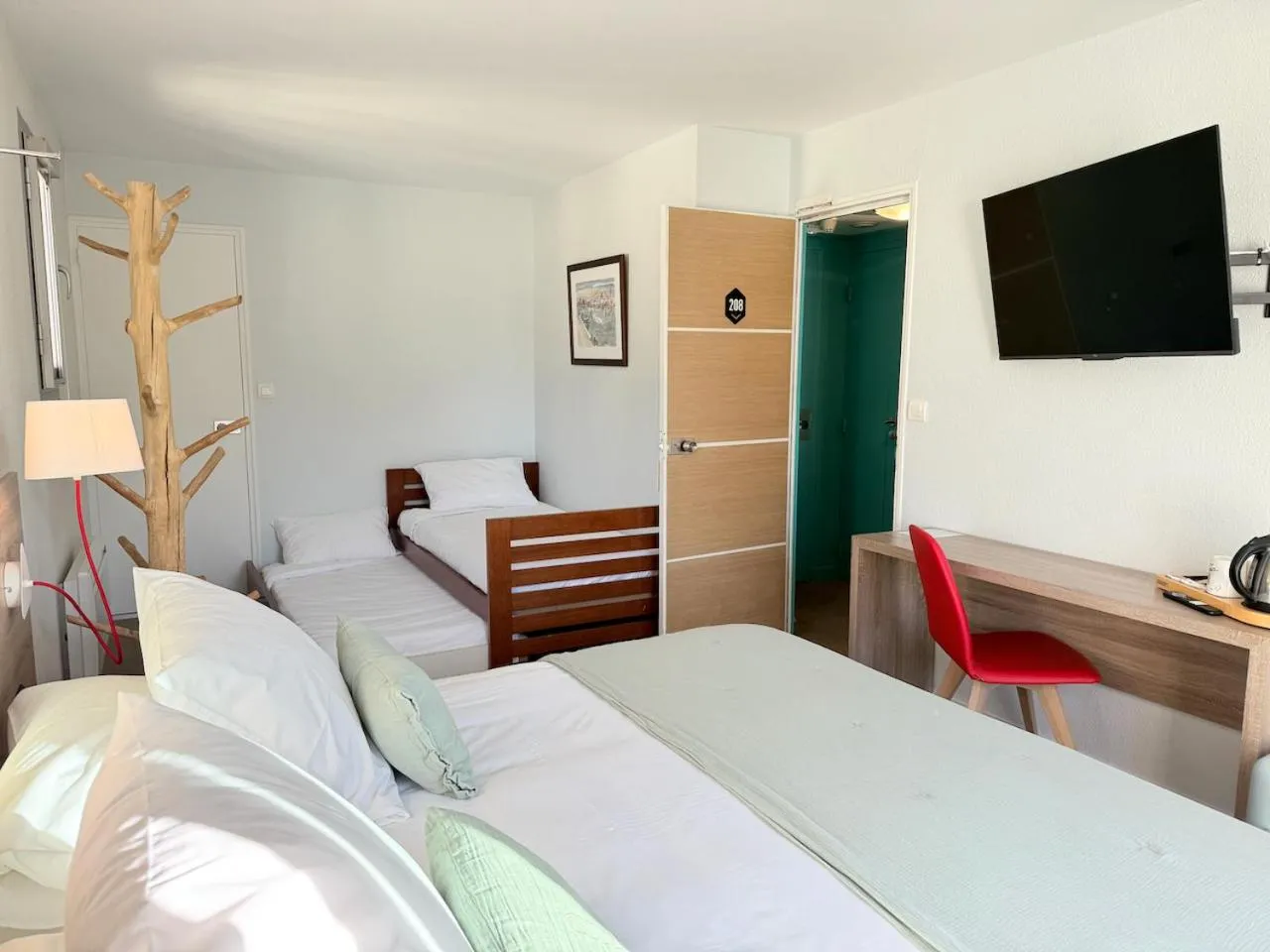 Bed in Hôtel Beau Soleil