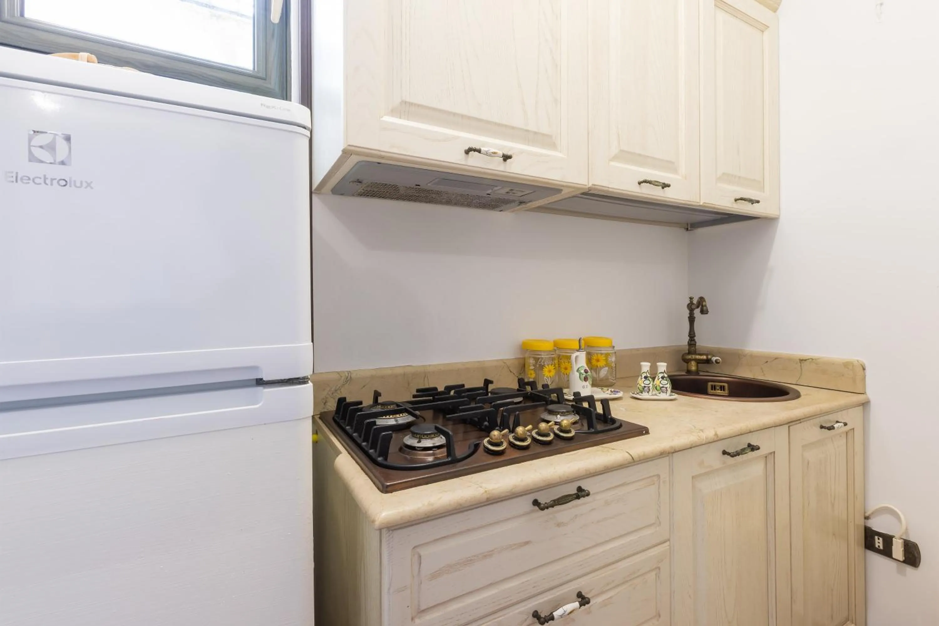 Kitchen or kitchenette in Casa Ulmi con piscina