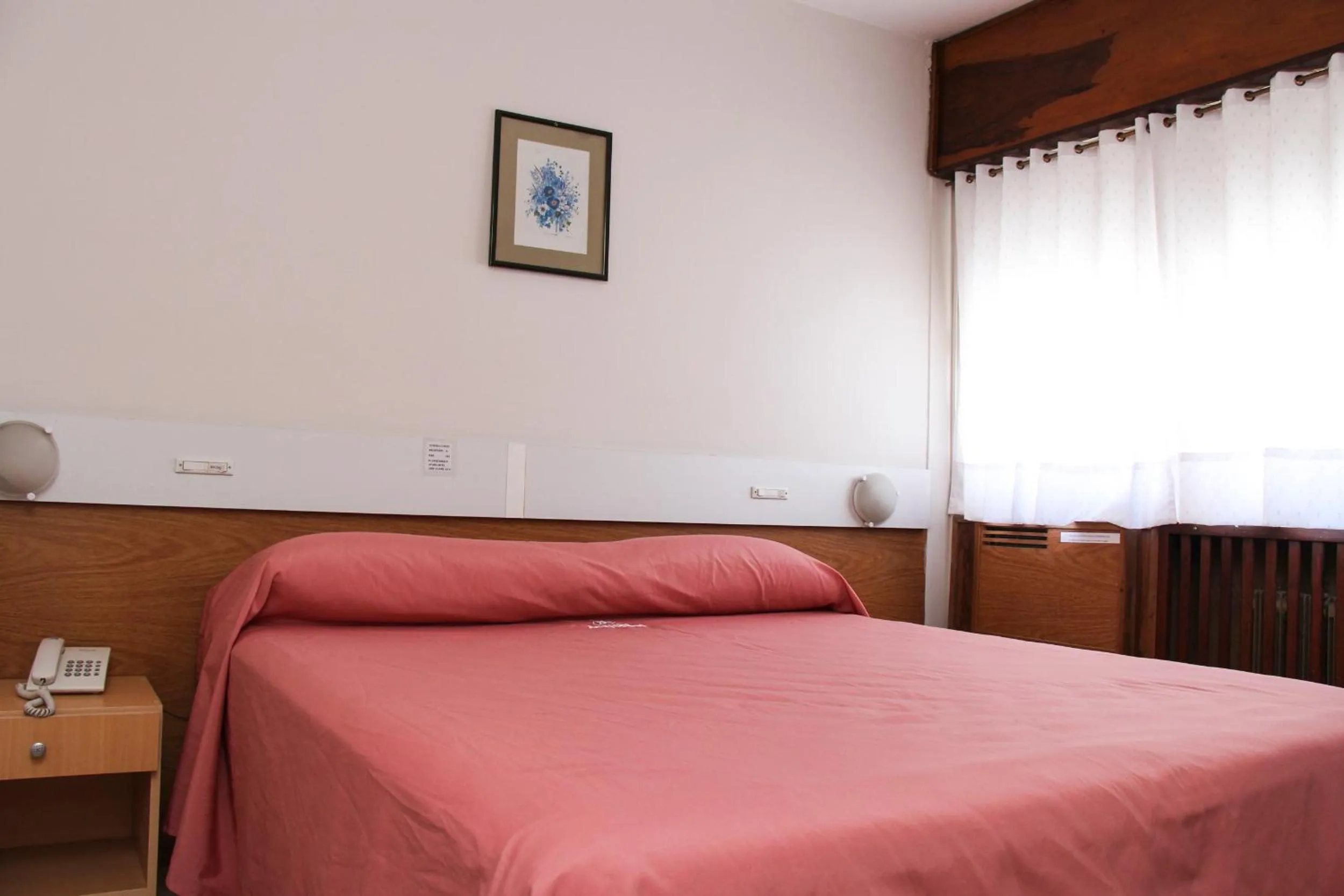 Bed in Hotel Menossi