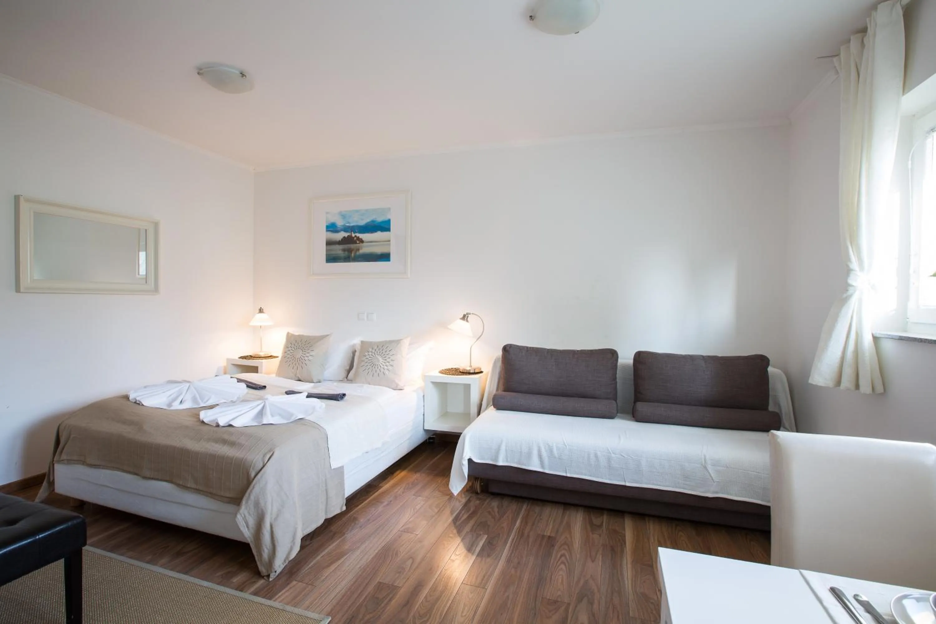 Photo of the whole room, Bed in Bled Apartments