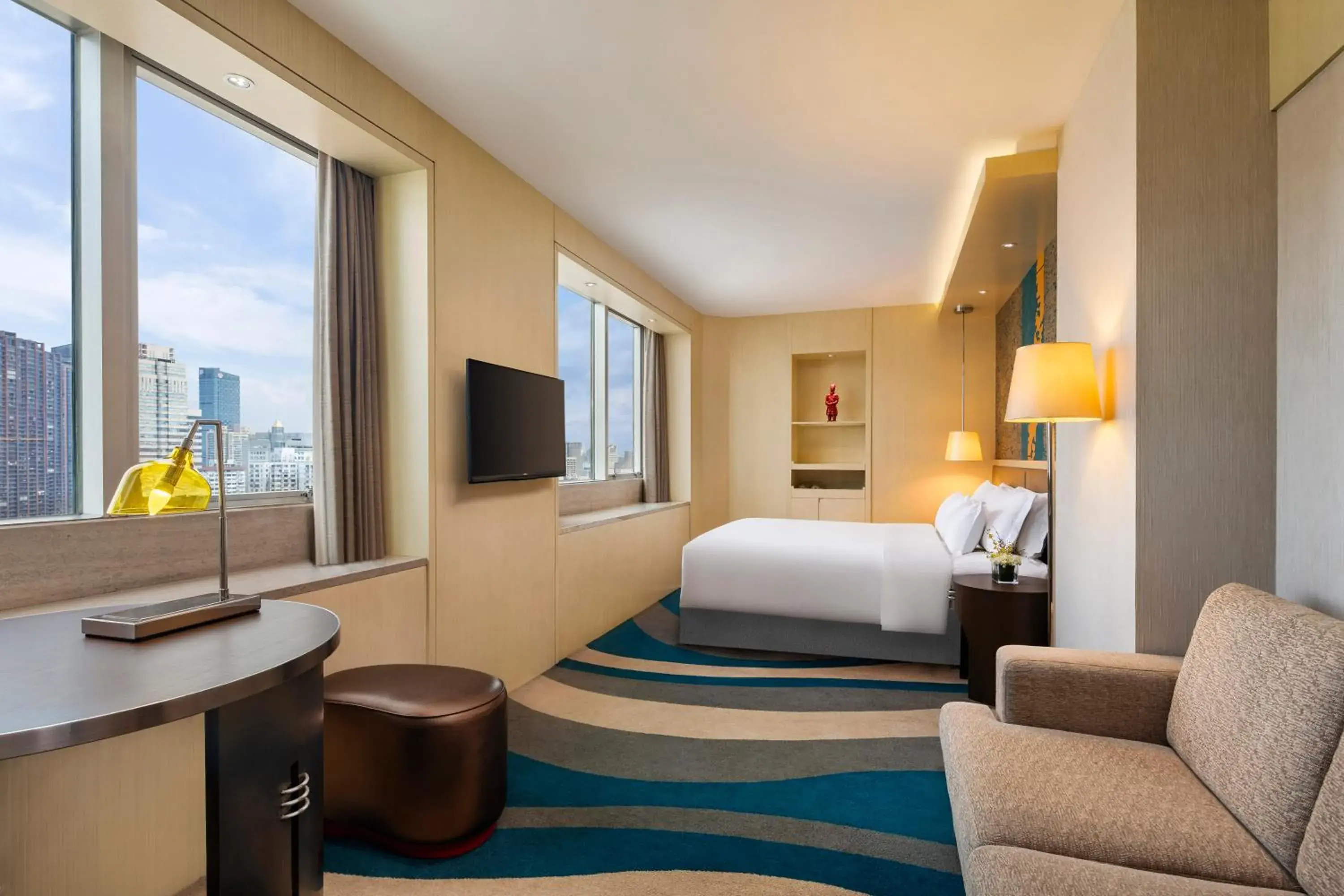 Communal lounge/ TV room, Bed in Radisson Collection Hyland Shanghai Communal lounge/ TV room, Bed in Radisson Collection Hyland Shanghai