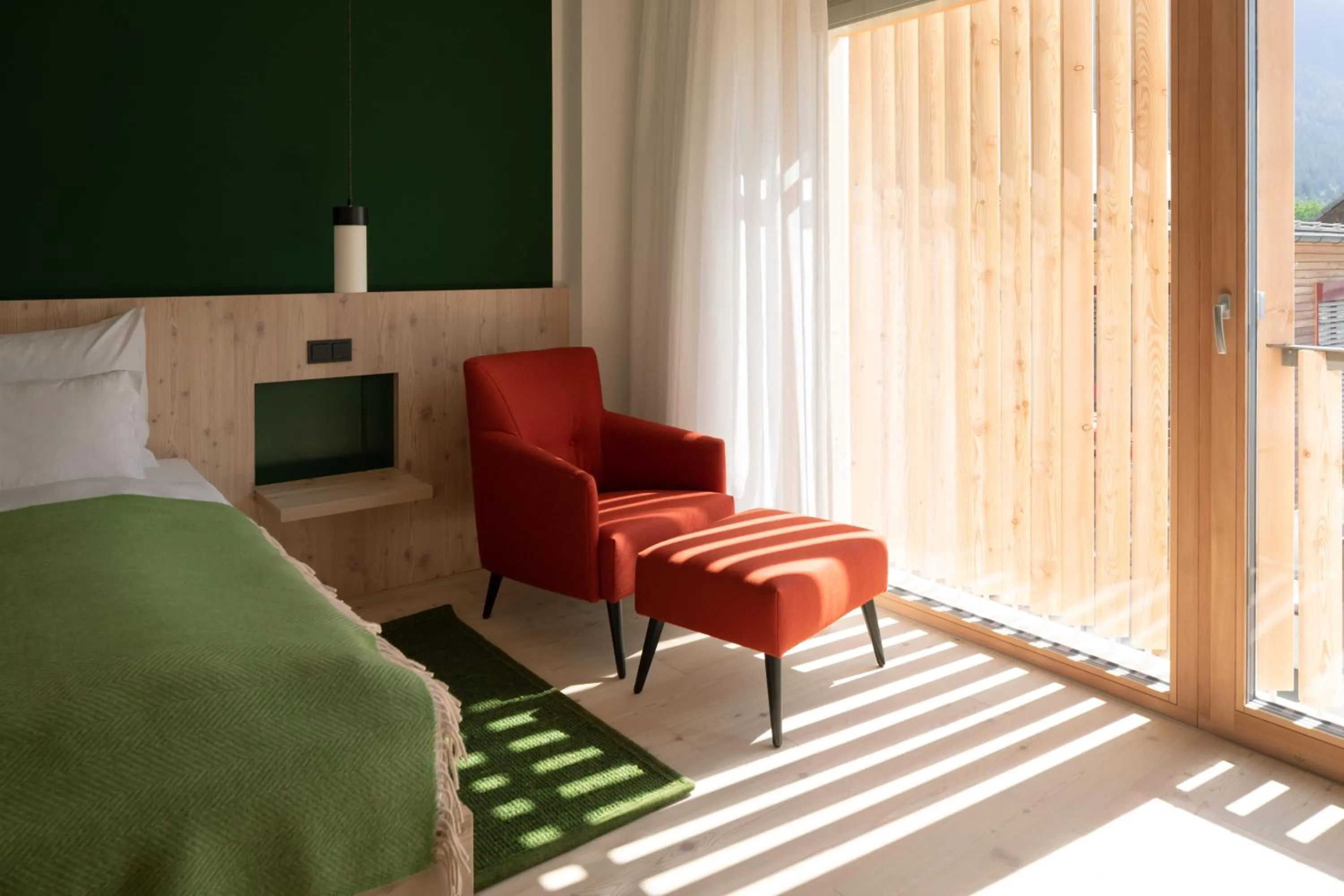Seating area, Bed in Hotel Neusacherhof
