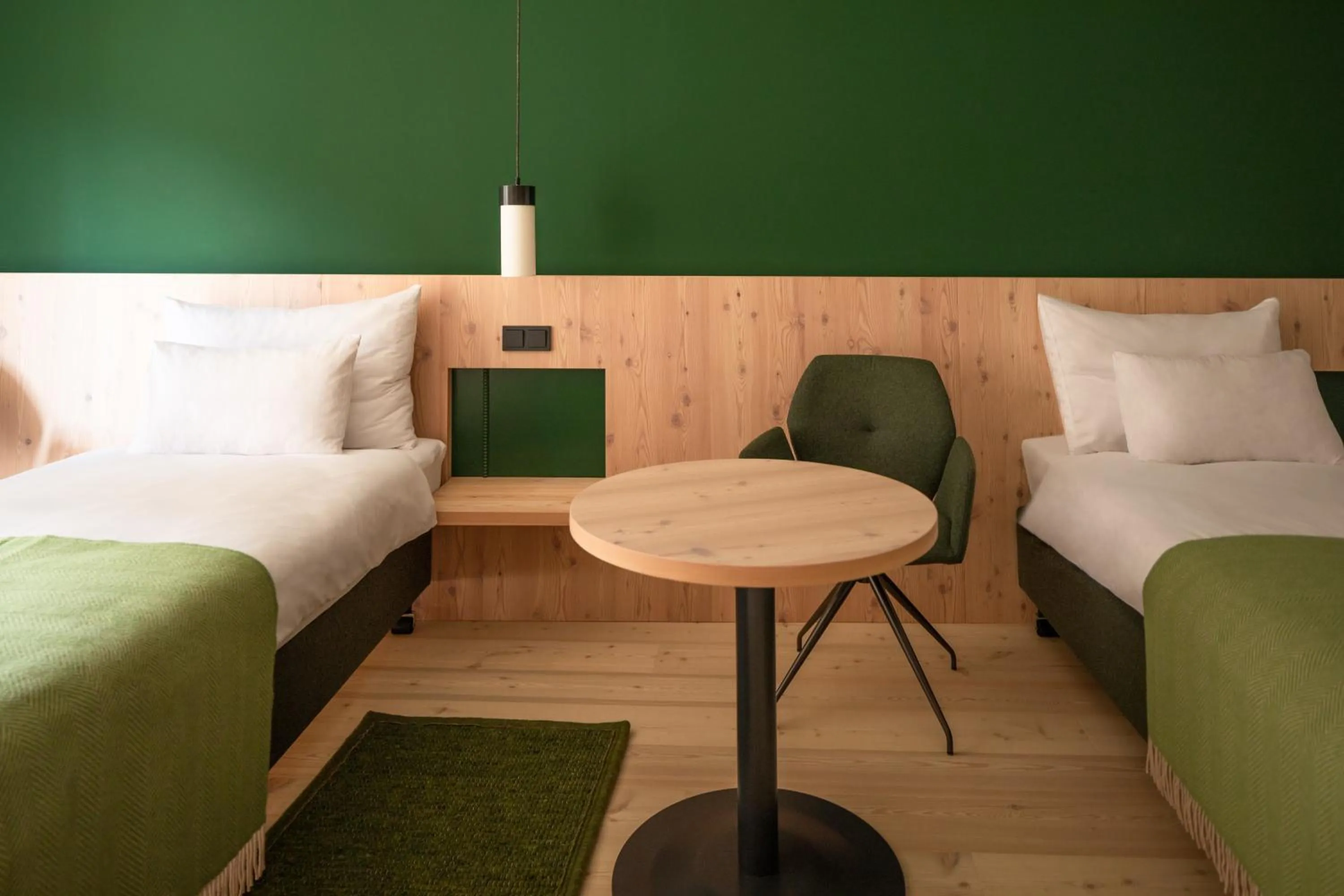 Seating area, Bed in Hotel Neusacherhof