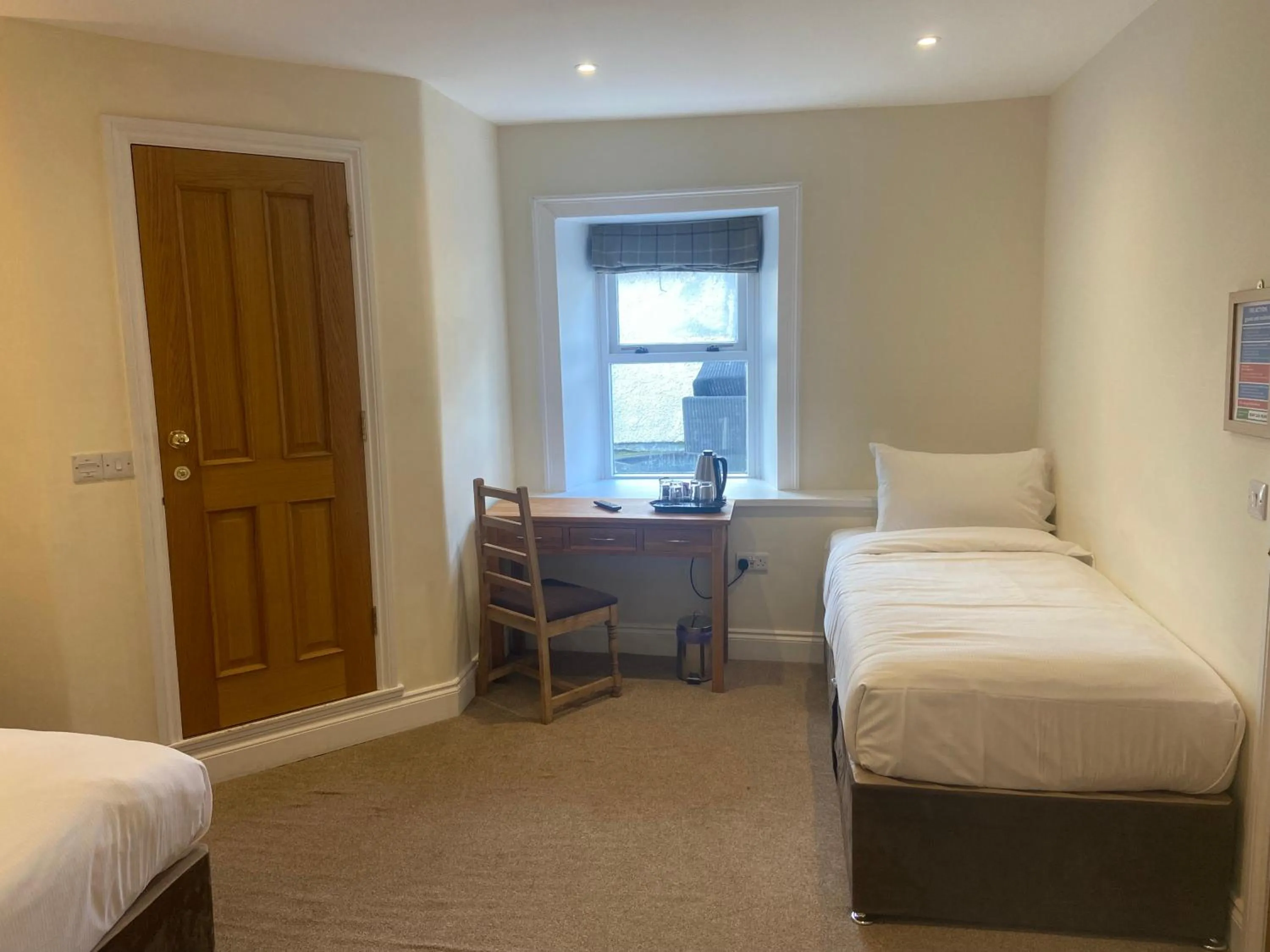 Bedroom in The Greyhound Hotel