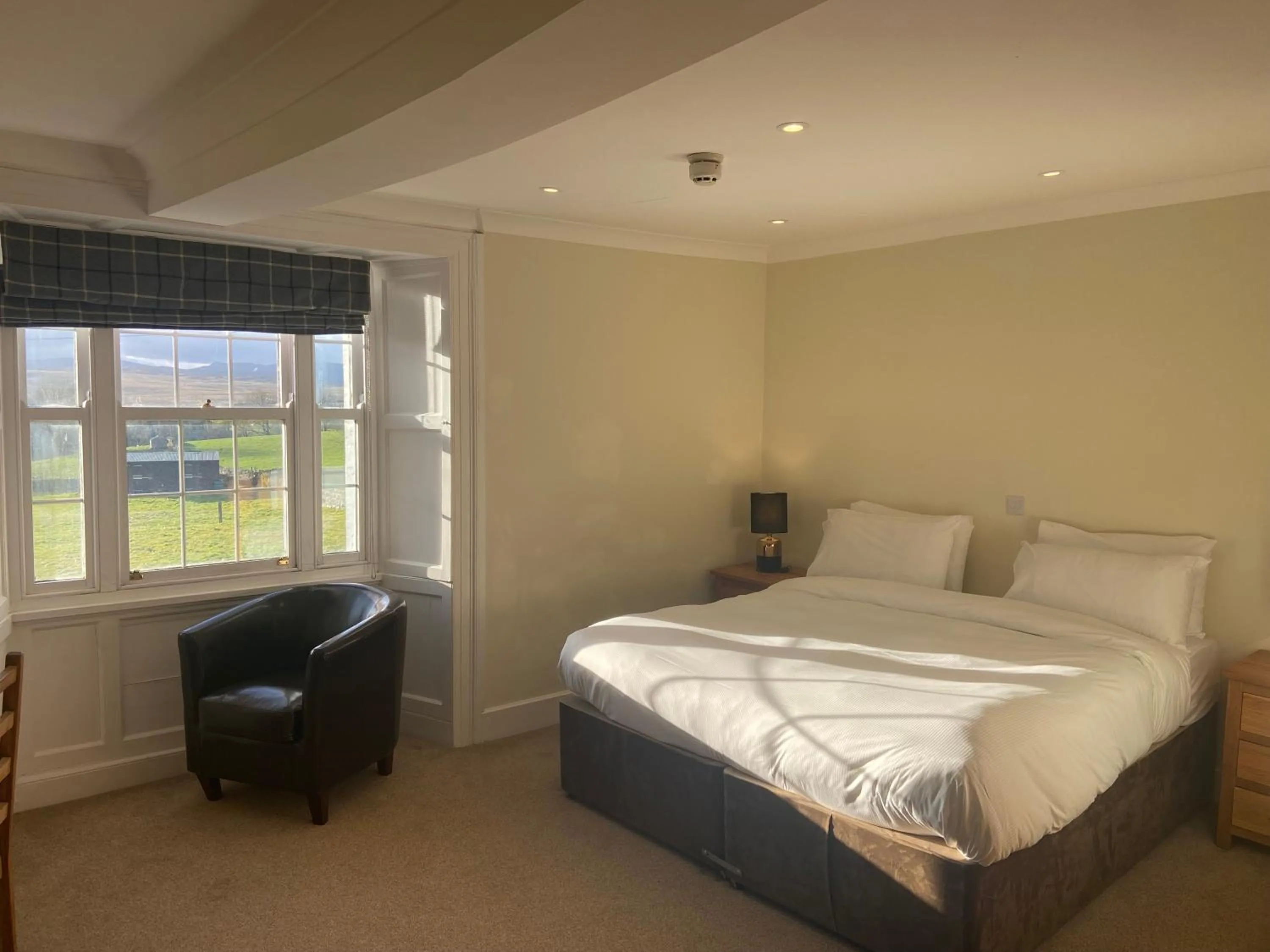 Bedroom in The Greyhound Hotel