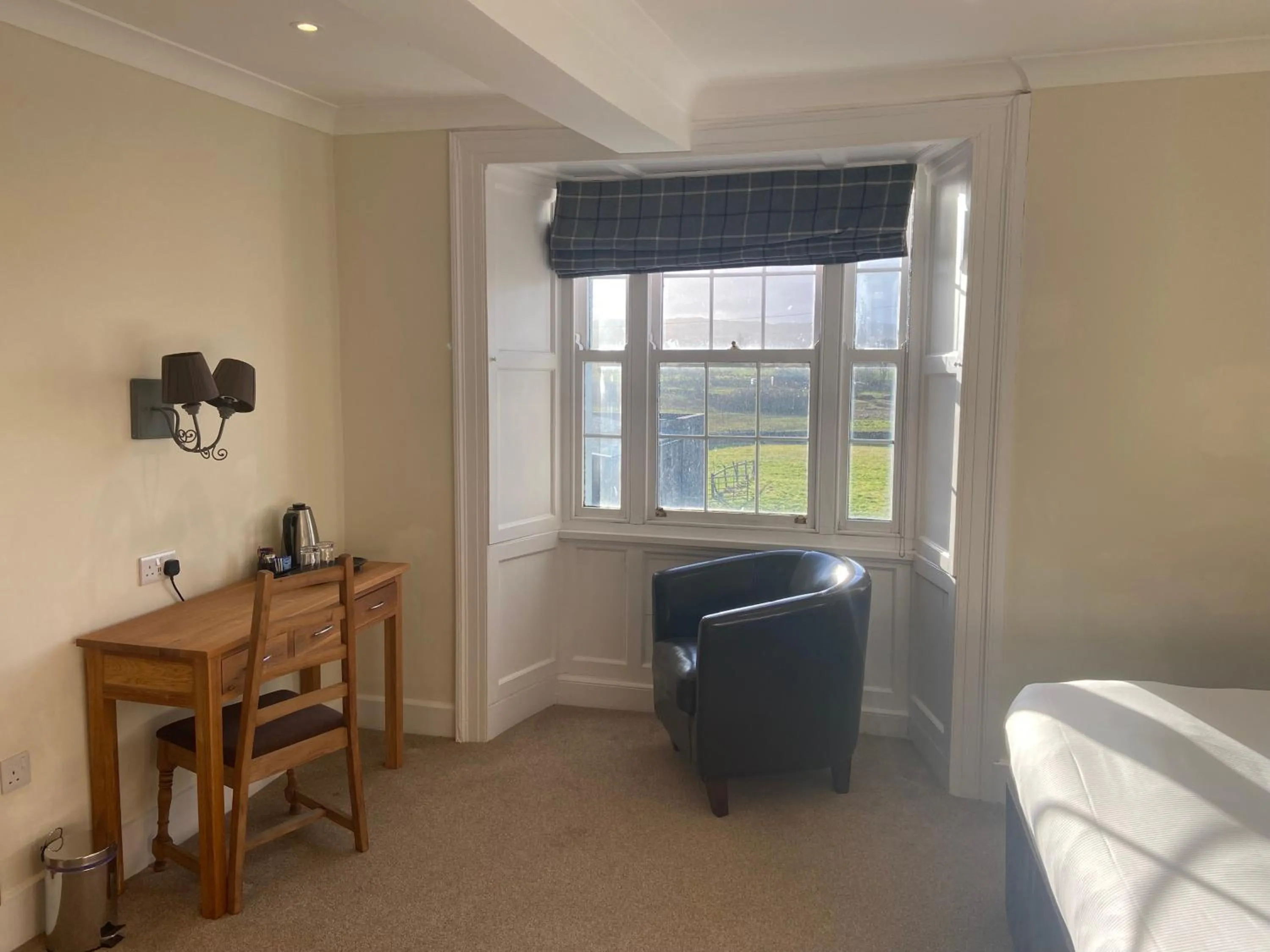 Bedroom in The Greyhound Hotel