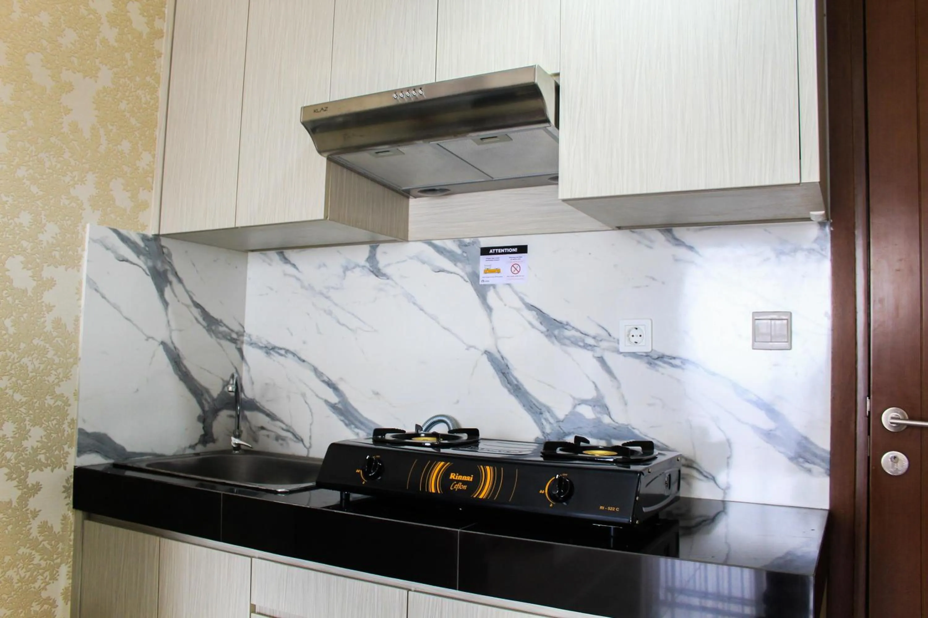 Minimalist 1BR Apartment at M-Town Signature By Travelio