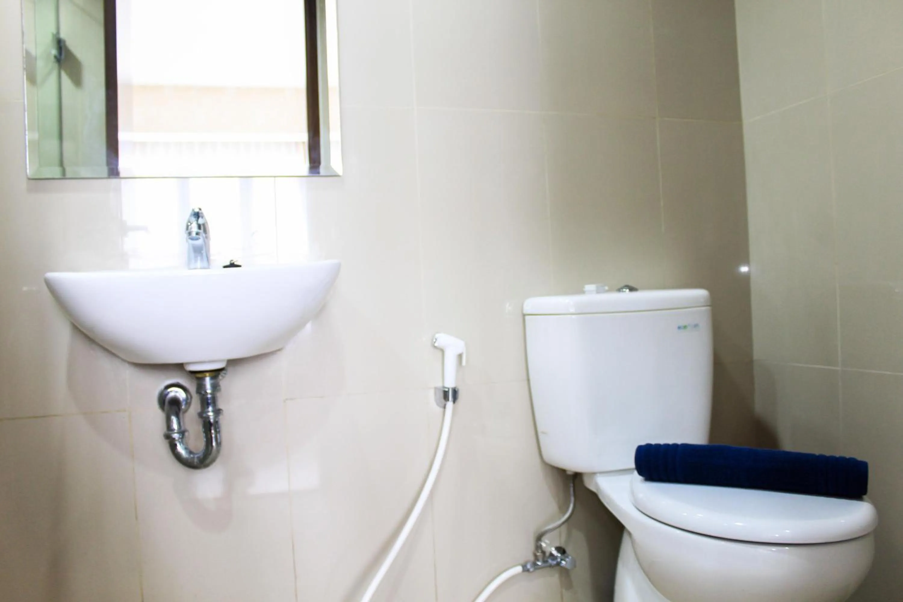 Minimalist 1BR Apartment at M-Town Signature By Travelio