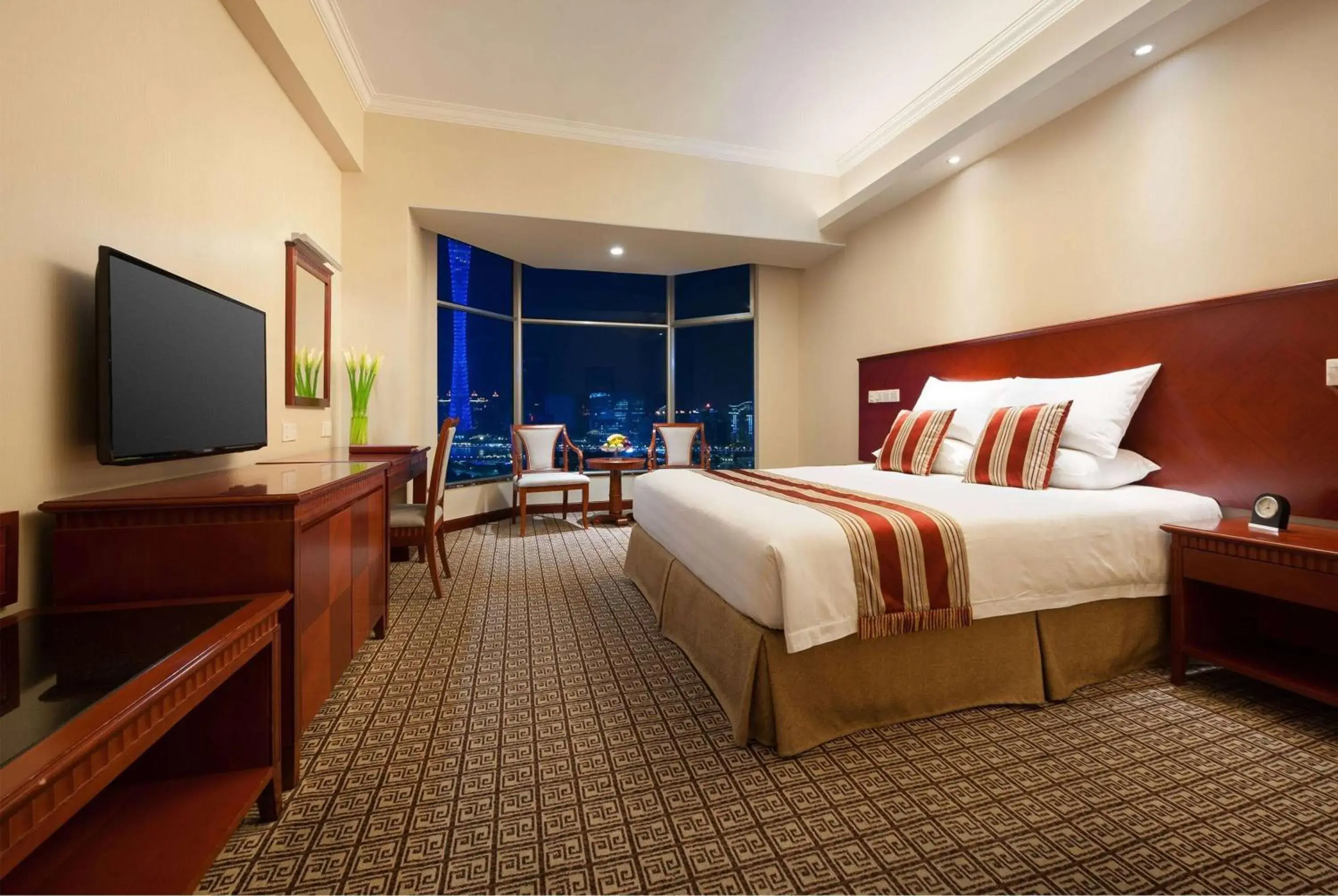 Photo of the whole room, Bed in Ramada by Wyndham Pearl Guangzhou-Canton Fair Free Shuttle Bus Photo of the whole room, Bed in Ramada by Wyndham Pearl Guangzhou-Canton Fair Free Shuttle Bus