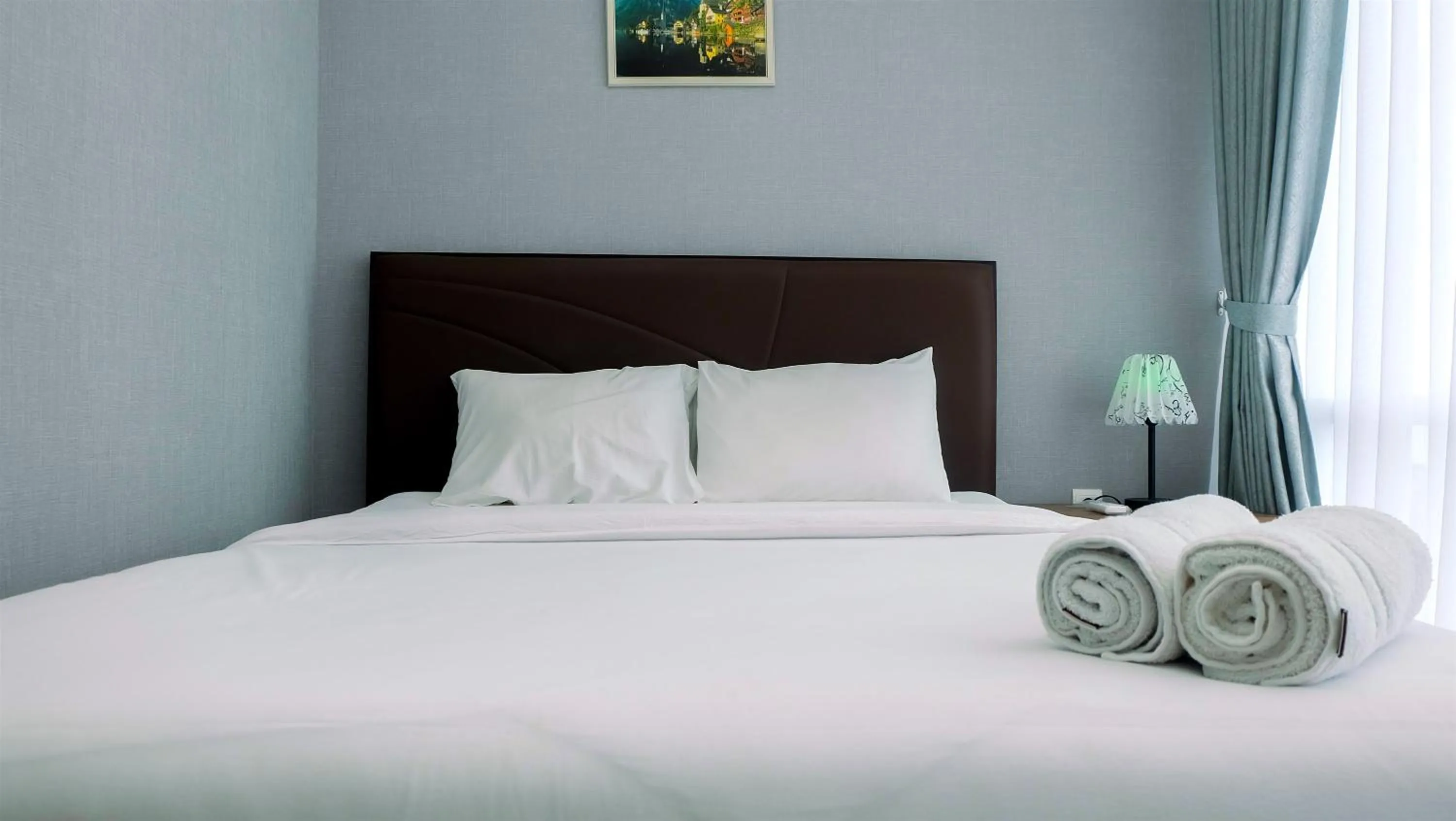 Bed in Classy 2BR Apartment at Menteng Park with City View By Travelio