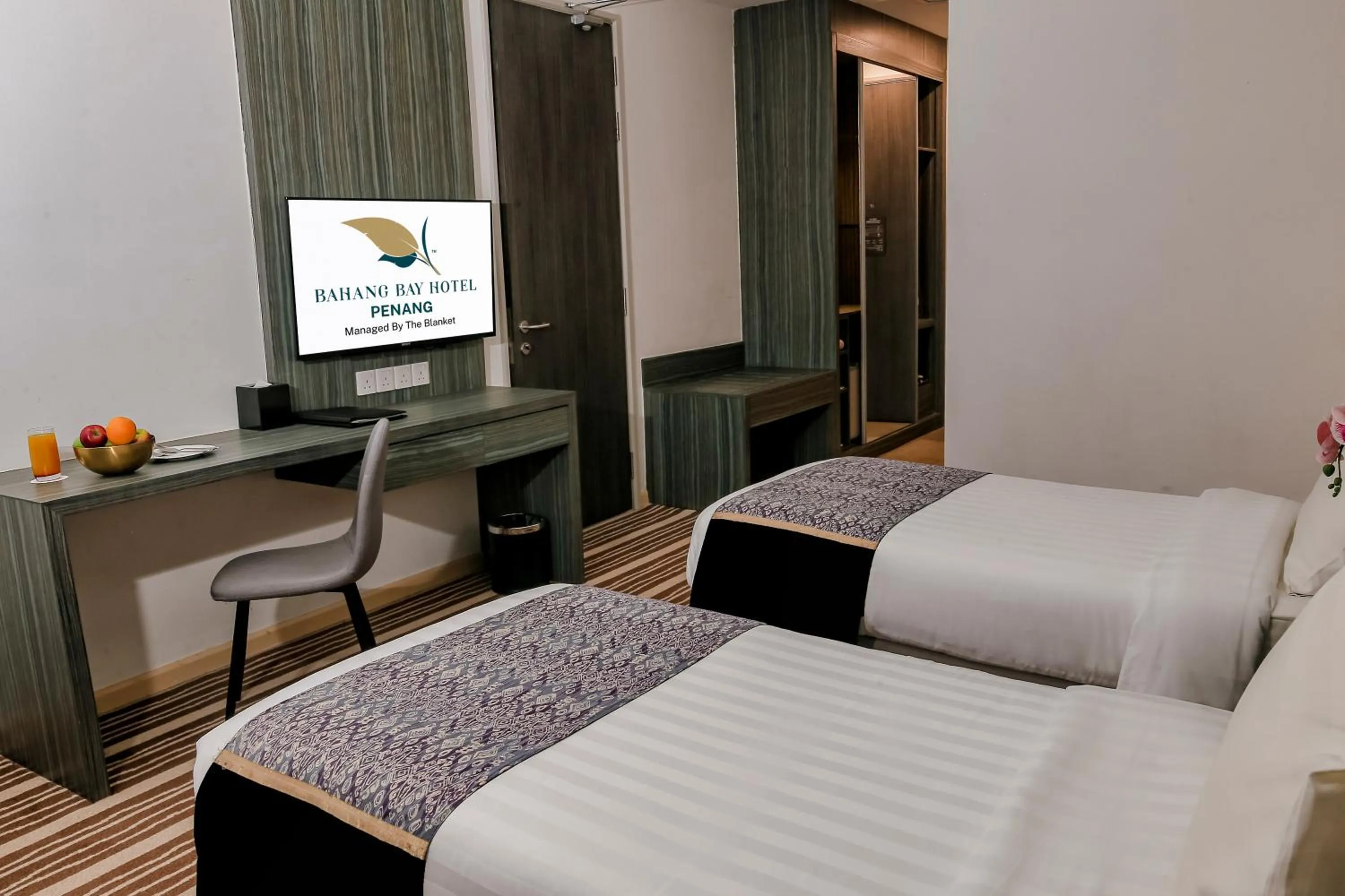 Bed in Bahang Bay Hotel