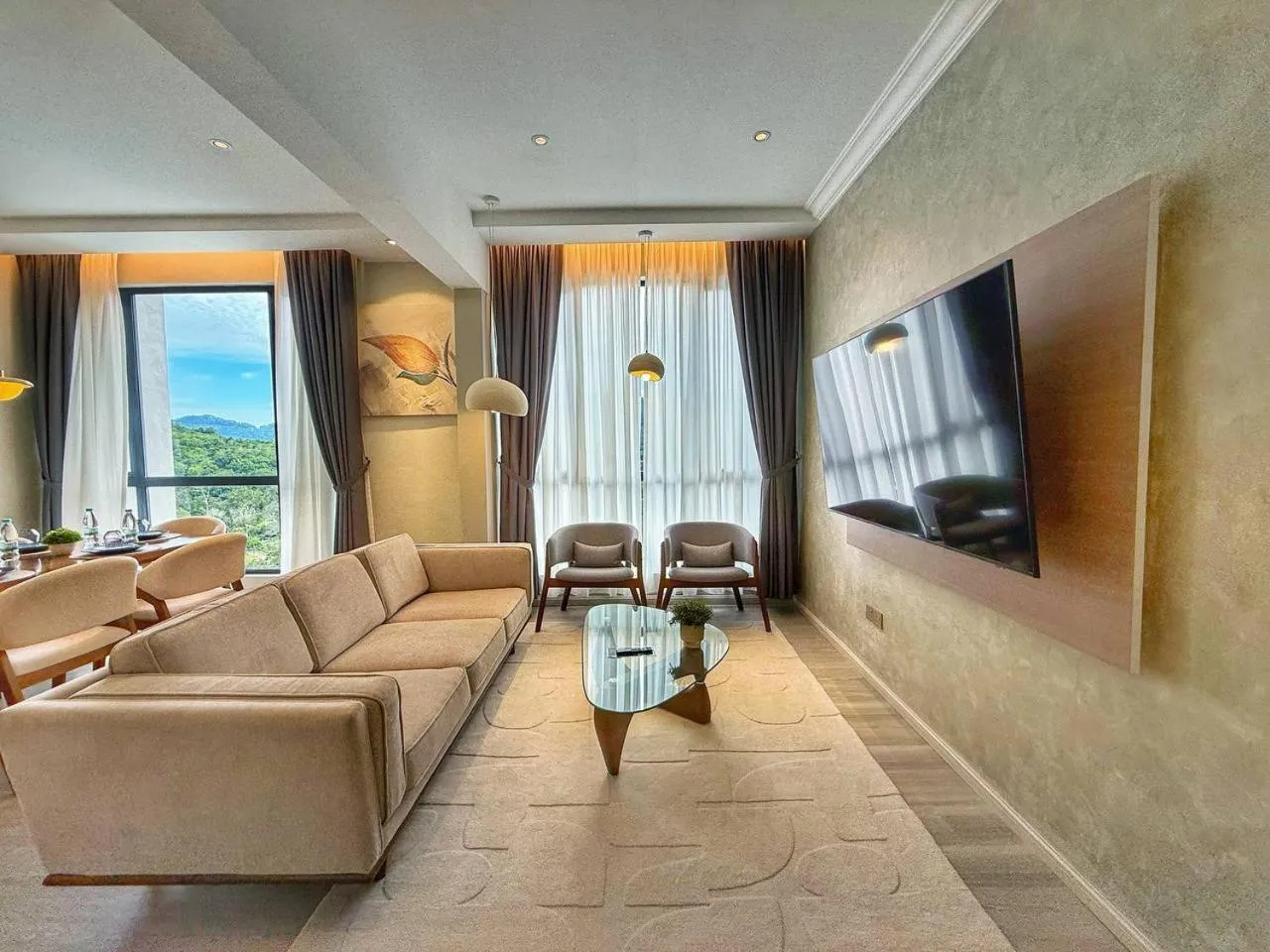 Communal lounge/ TV room in Bahang Bay Hotel