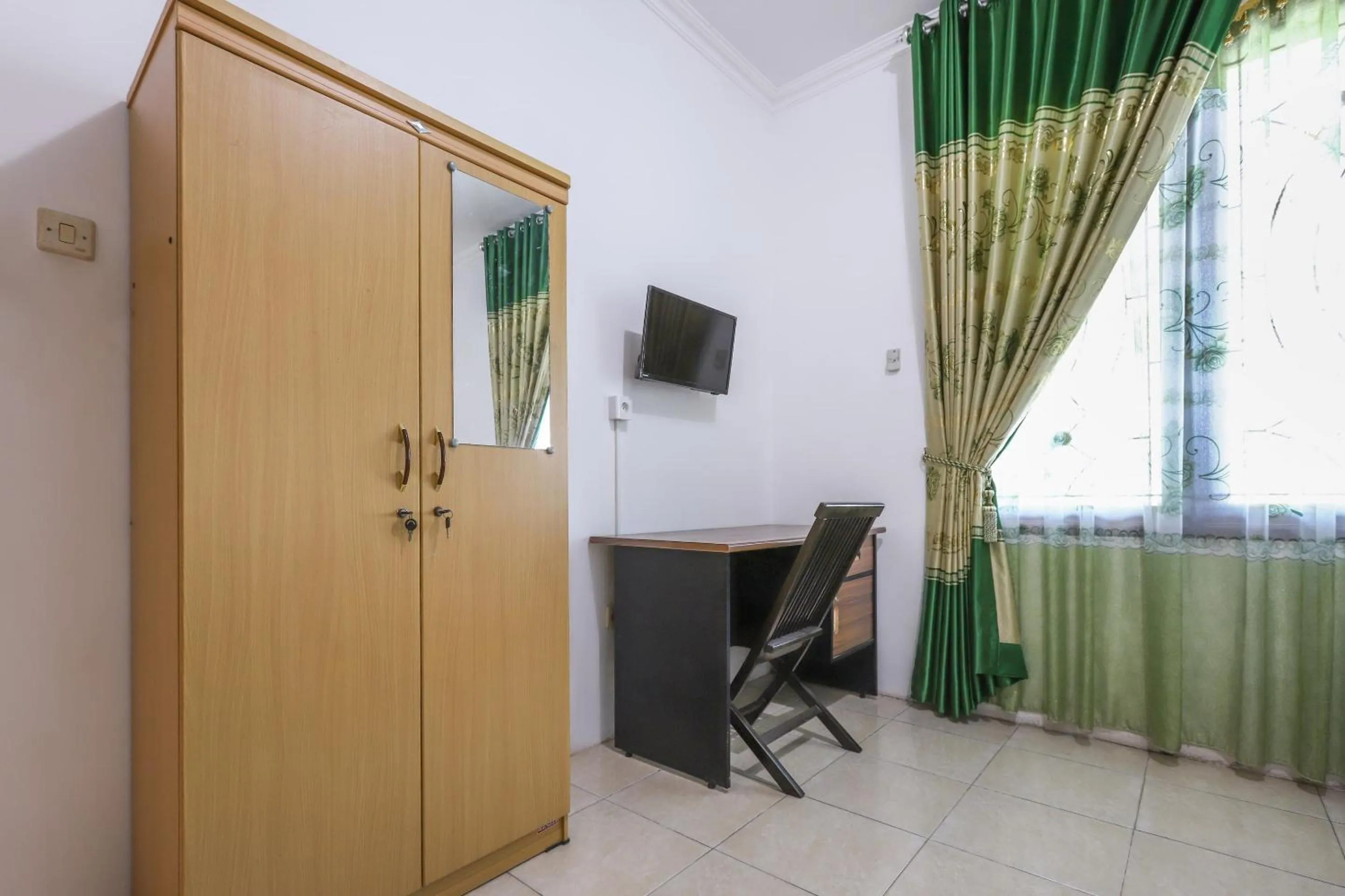 Bedroom in Hotel O Bukit Somber Residence Syariah