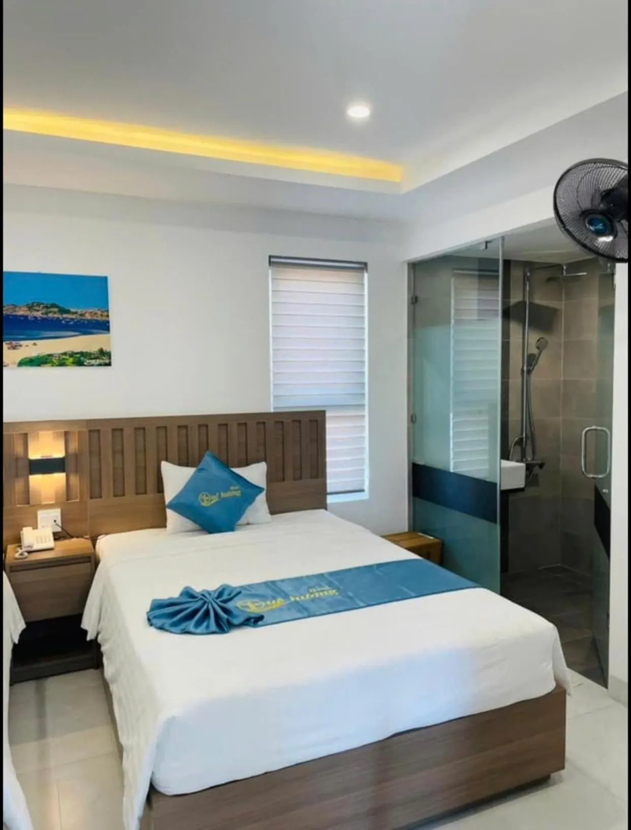 Bed in QUE HUONG HOTEL