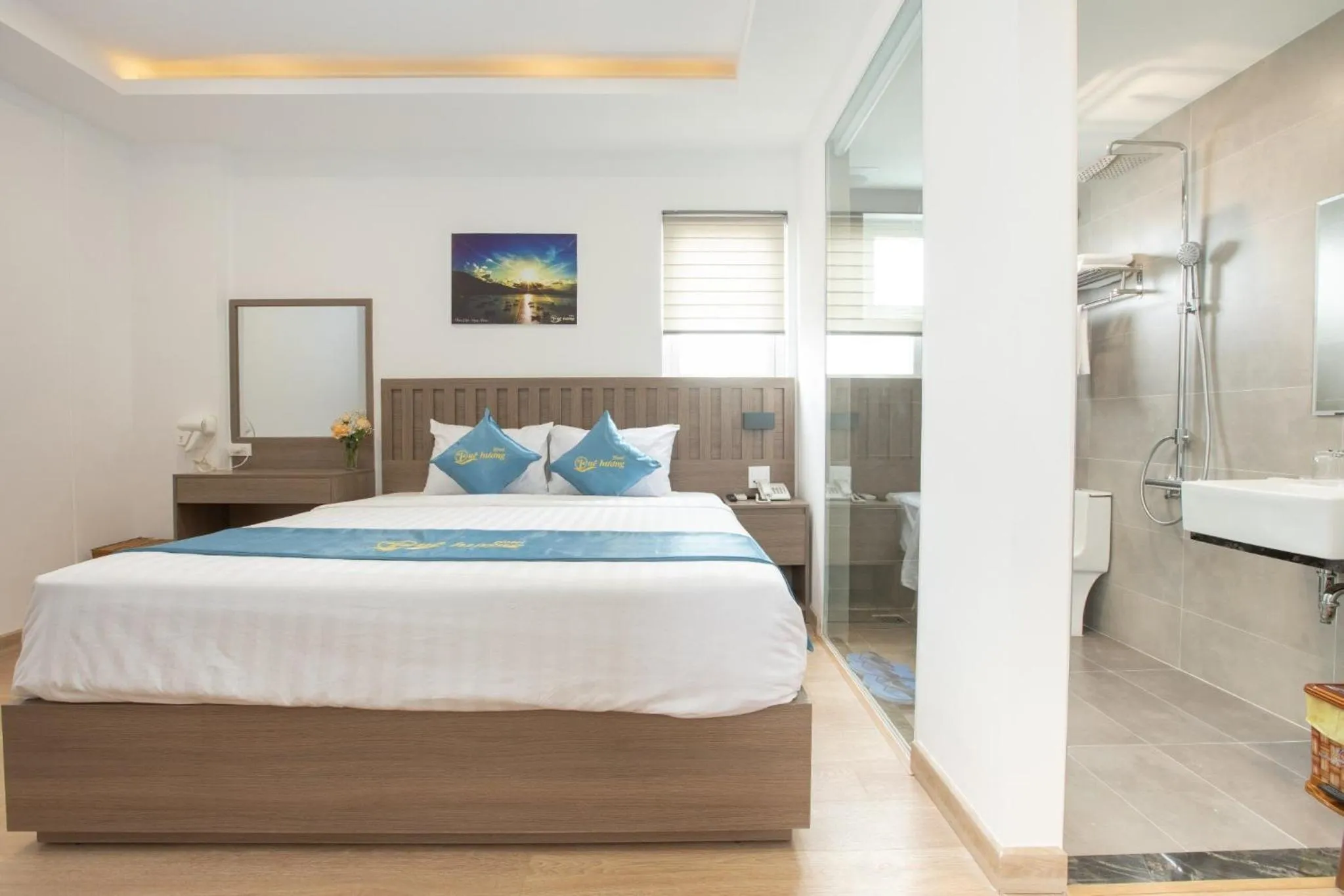 Bed in QUE HUONG HOTEL