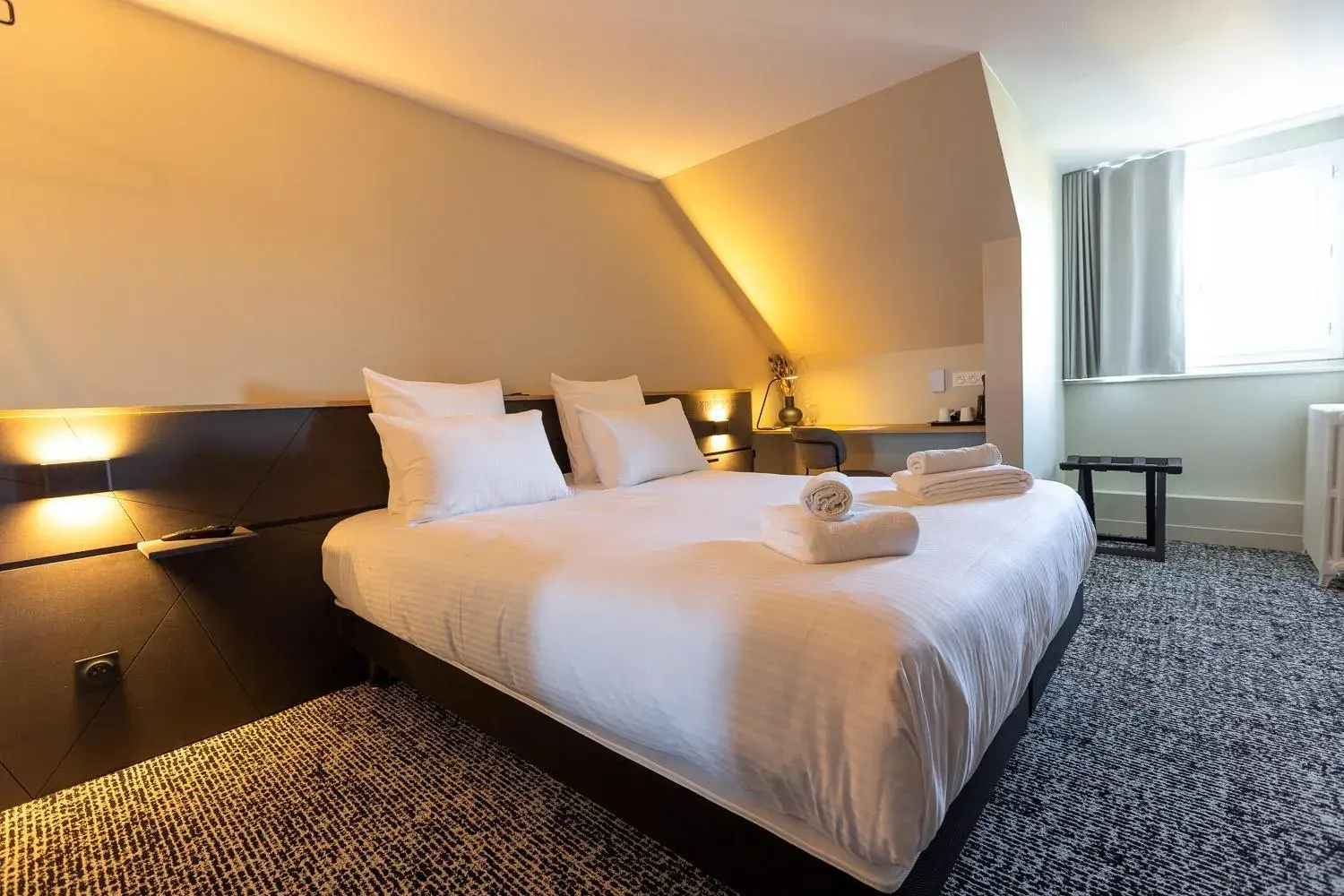 Bed in Logis Hôtel & Restaurant Le Vert Bocage Bed in Logis Hôtel & Restaurant Le Vert Bocage