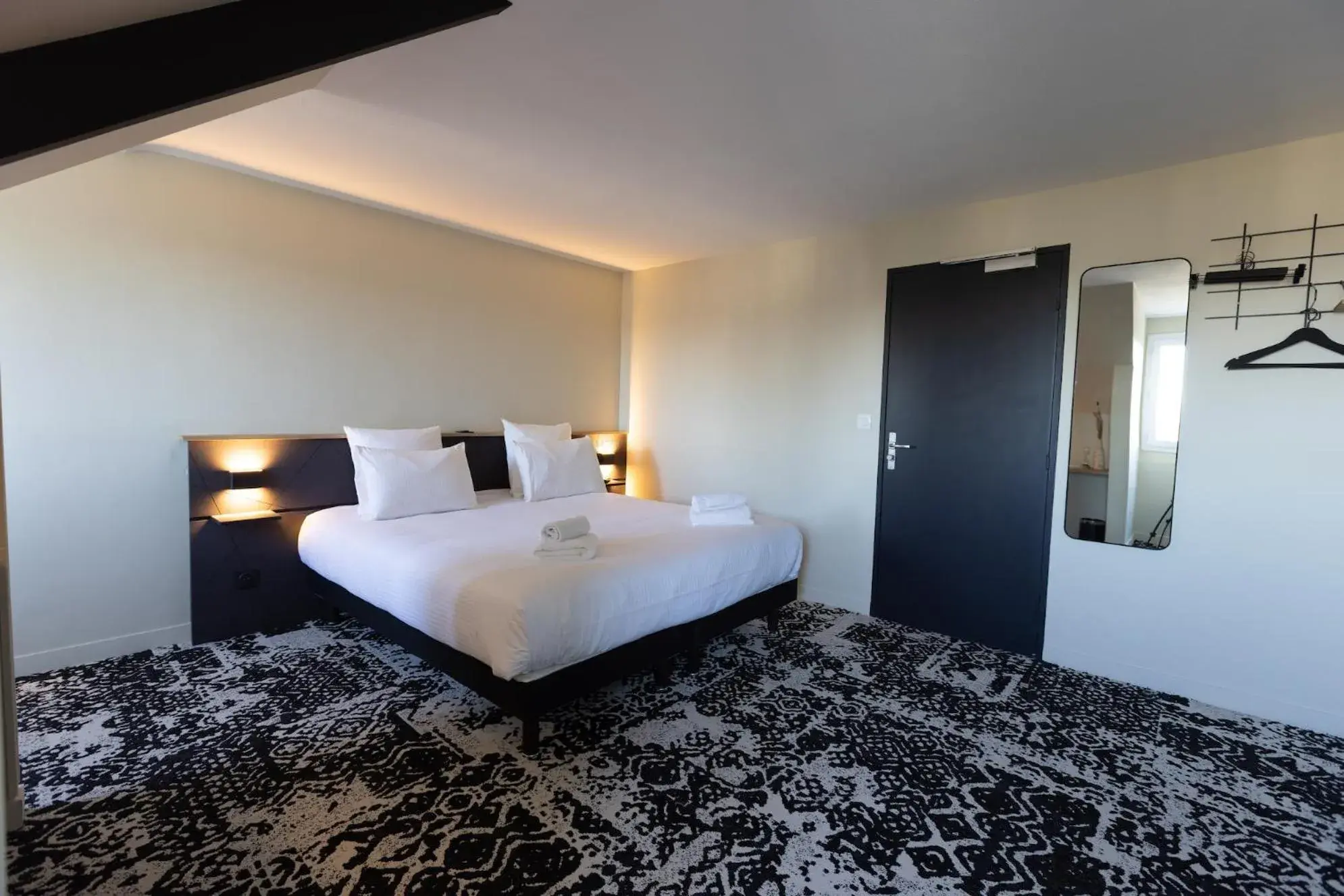 Photo of the whole room, Bed in Logis Hôtel & Restaurant Le Vert Bocage Photo of the whole room, Bed in Logis Hôtel & Restaurant Le Vert Bocage