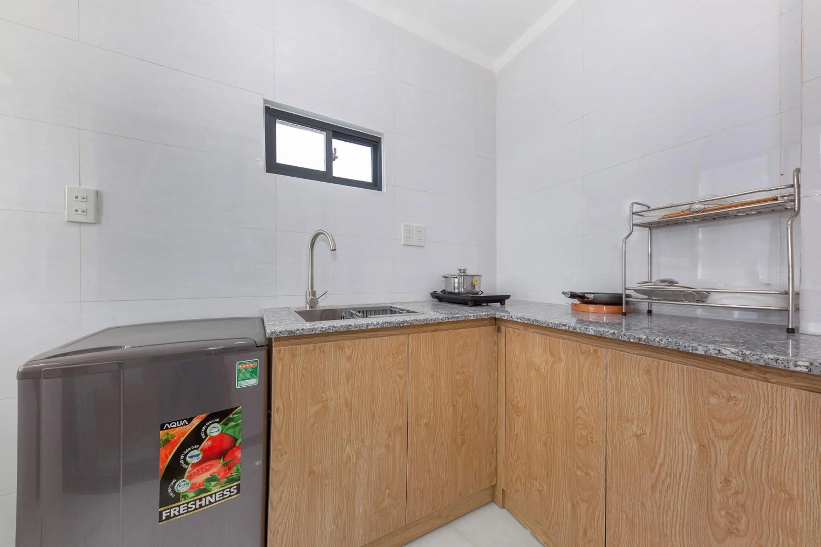 Kitchen or kitchenette in OYO 942 Cuong Hai Apartment
