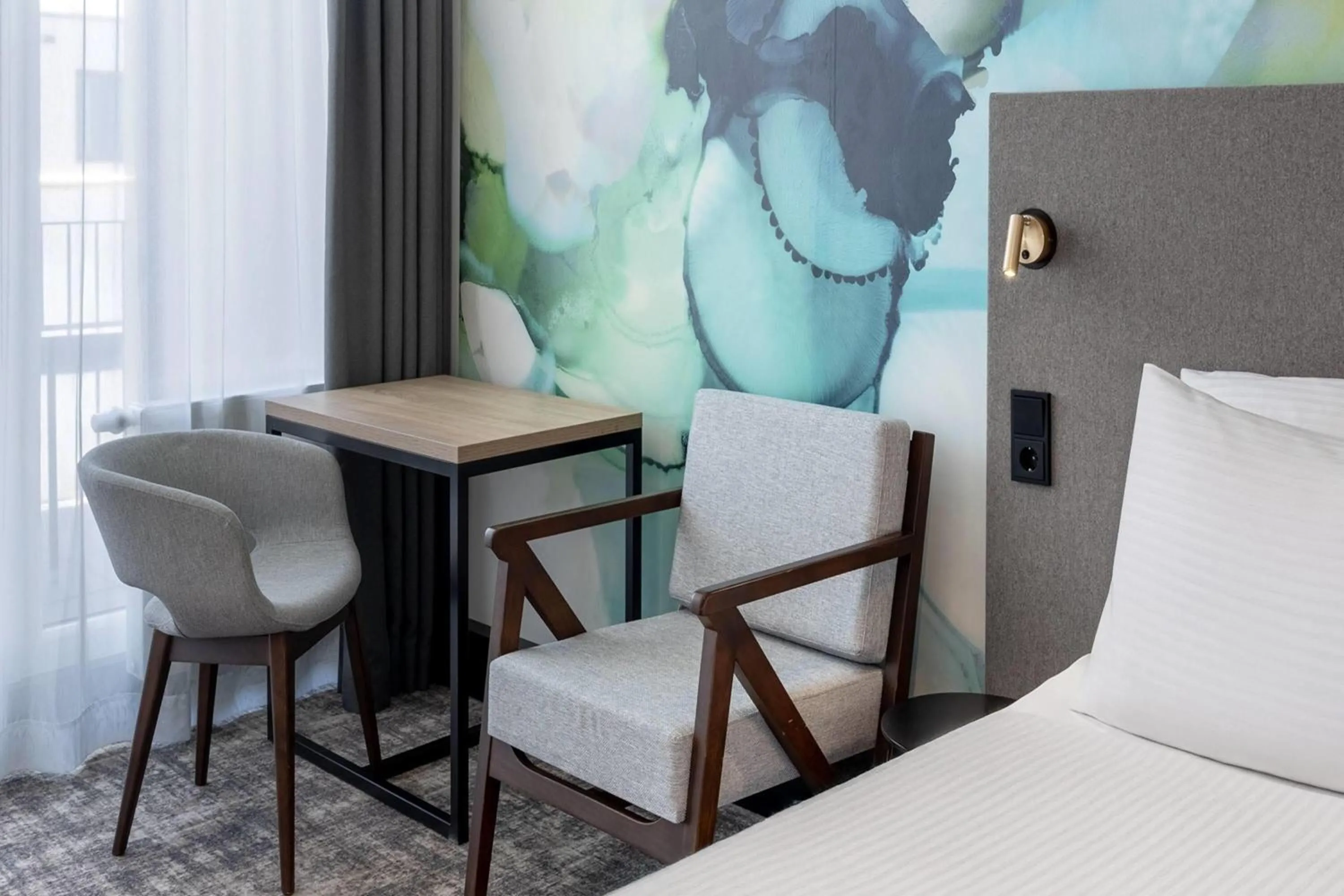 Photo of the whole room, Bed in Wyndham Garden Munich Messe