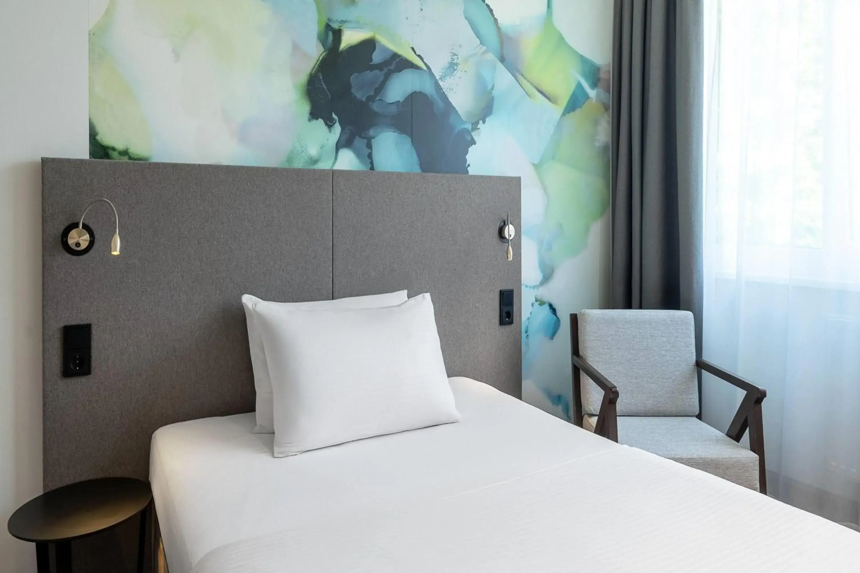 Photo of the whole room, Bed in Wyndham Garden Munich Messe Photo of the whole room, Bed in Wyndham Garden Munich Messe