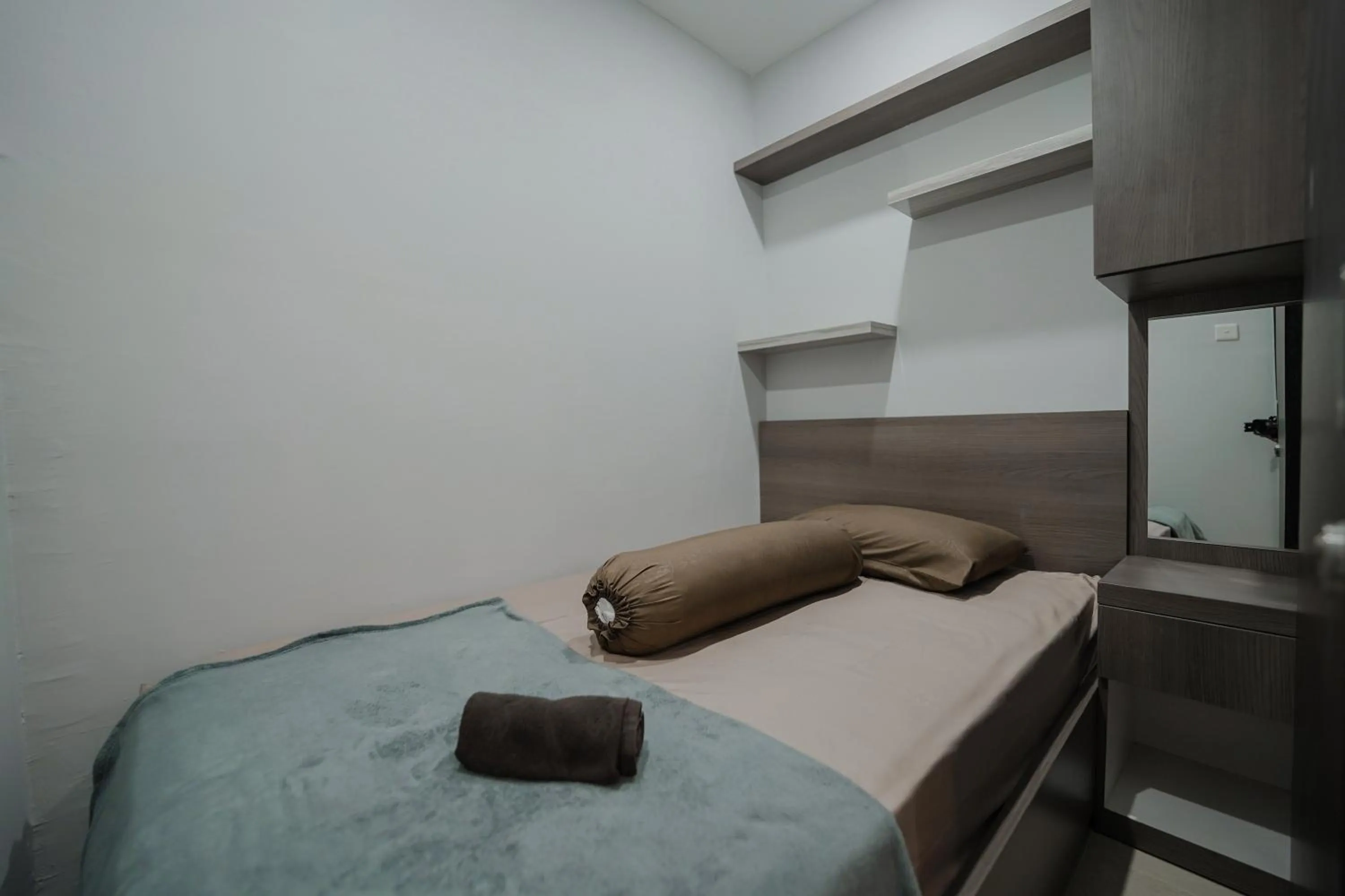 Bed in The Jarrdin by Bethania Pro