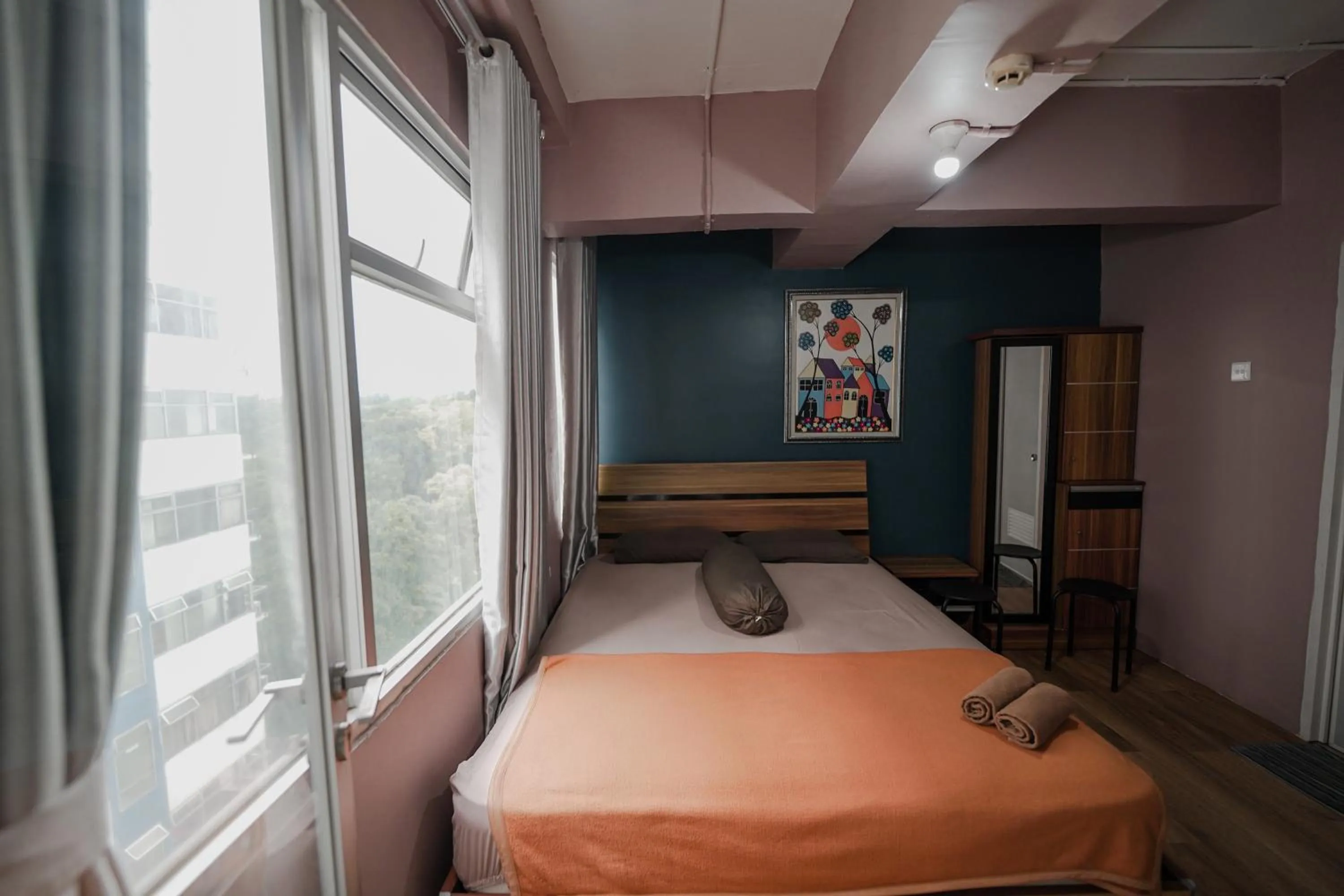 Bed in The Jarrdin by Bethania Pro