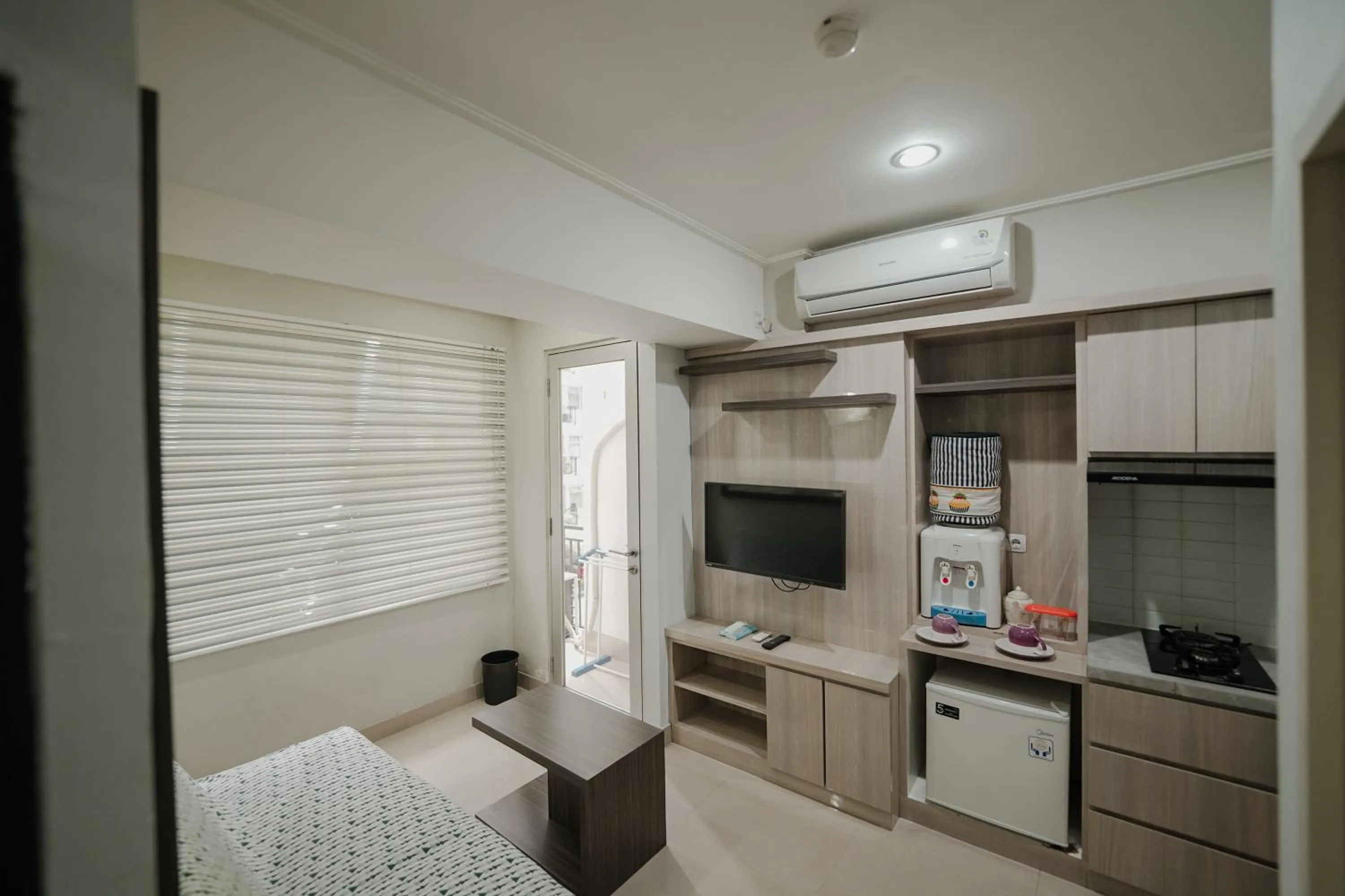 Bed in The Jarrdin by Bethania Pro