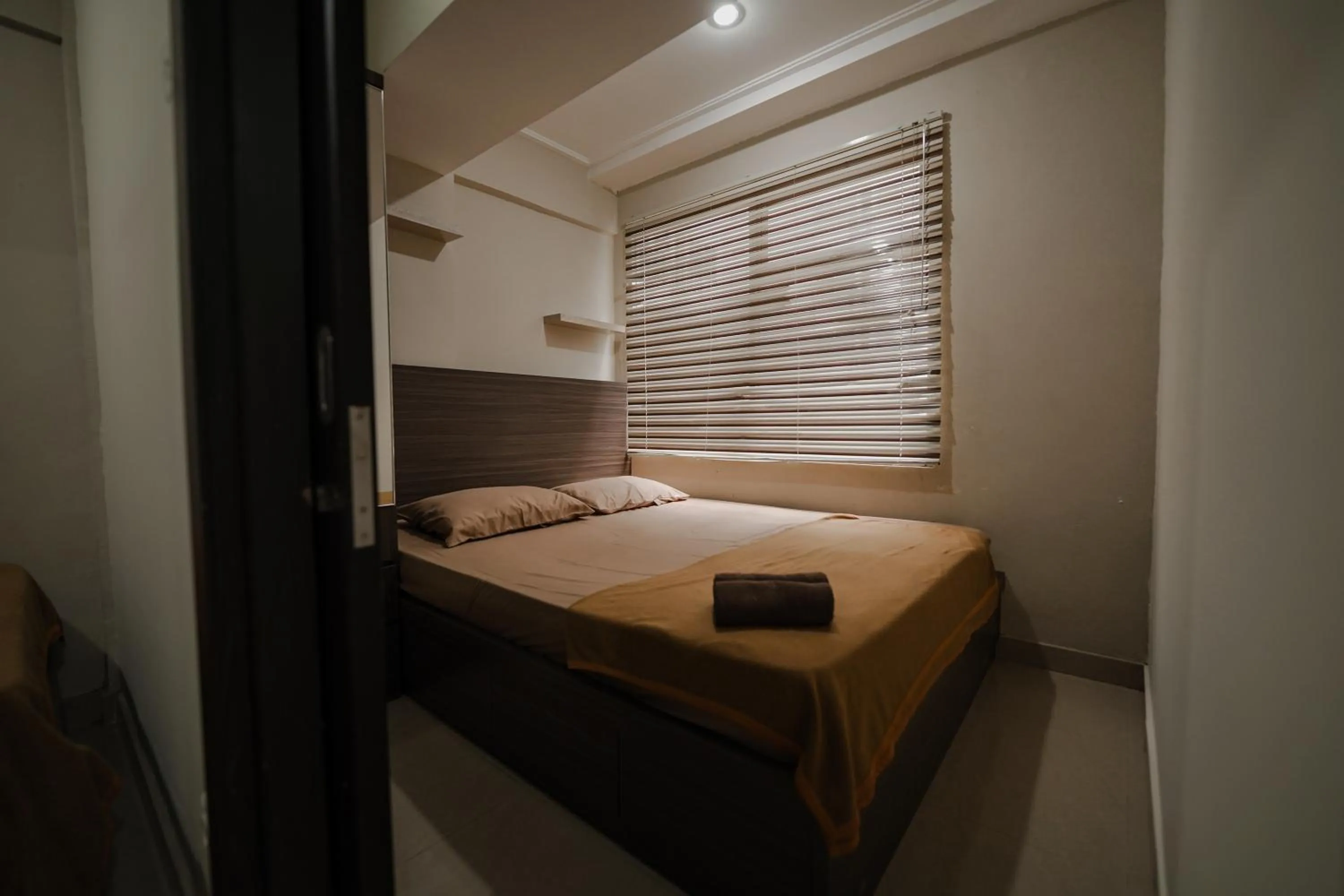 Bed in The Jarrdin by Bethania Pro