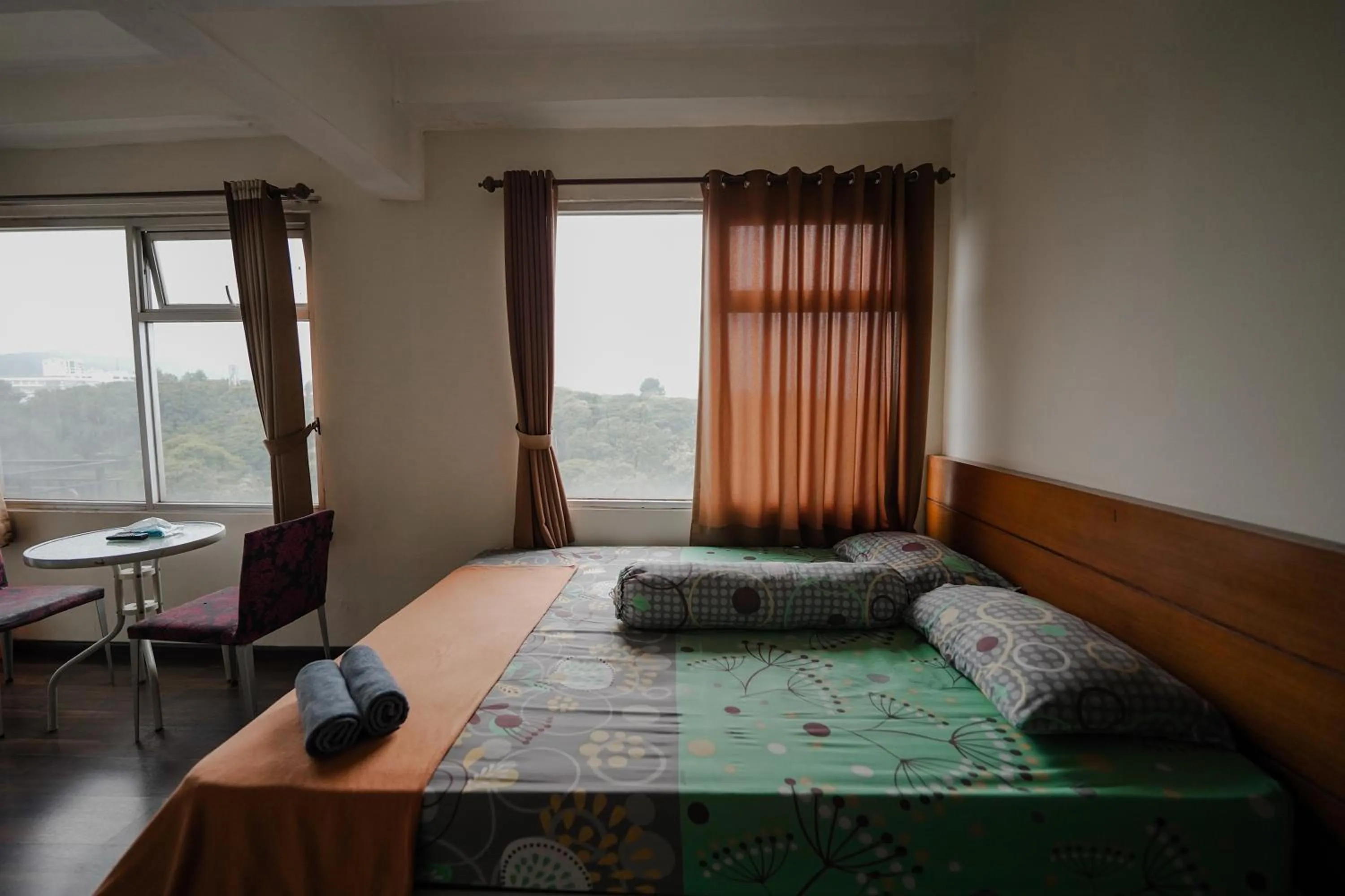 Bed in The Jarrdin by Bethania Pro