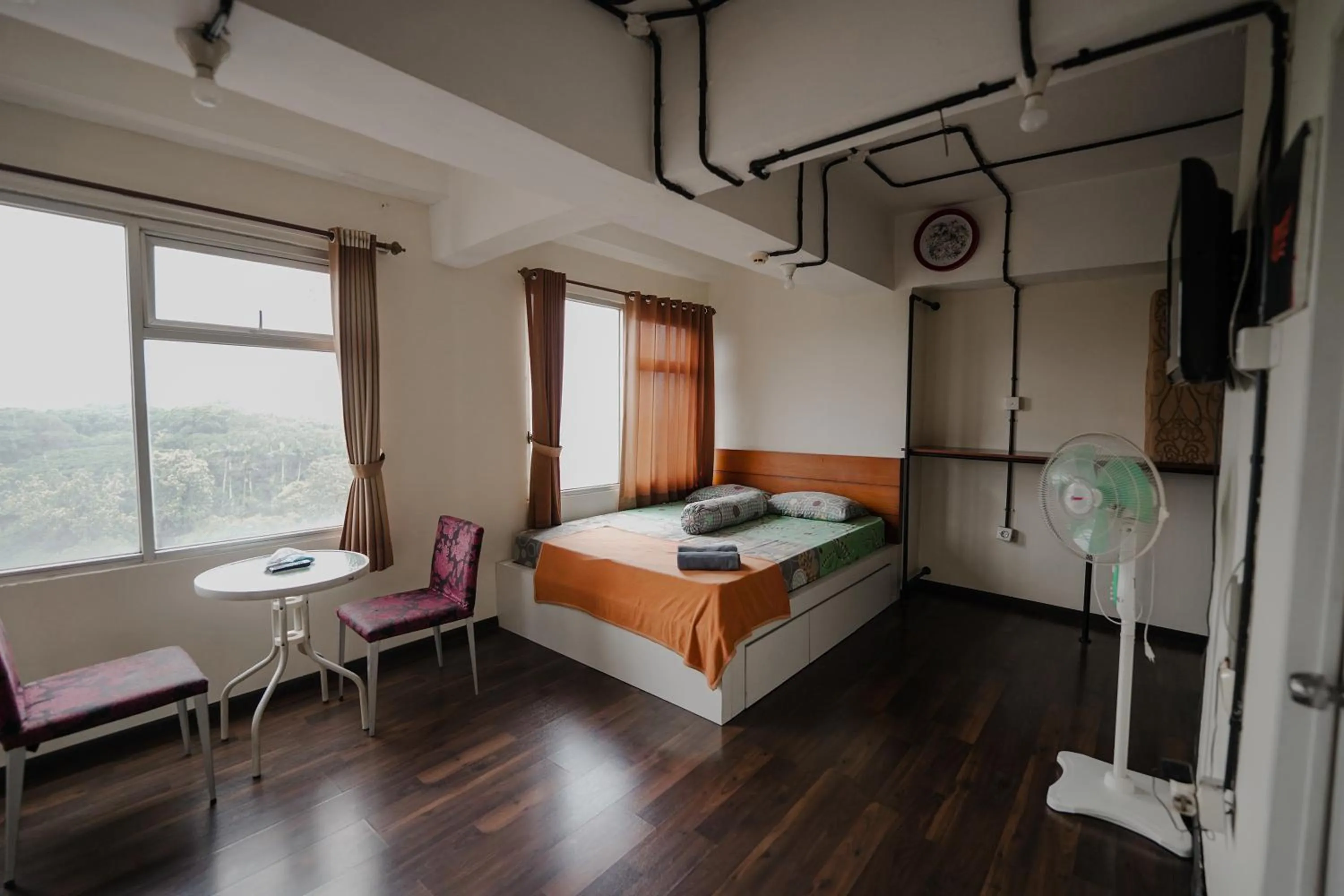 Bed in The Jarrdin by Bethania Pro