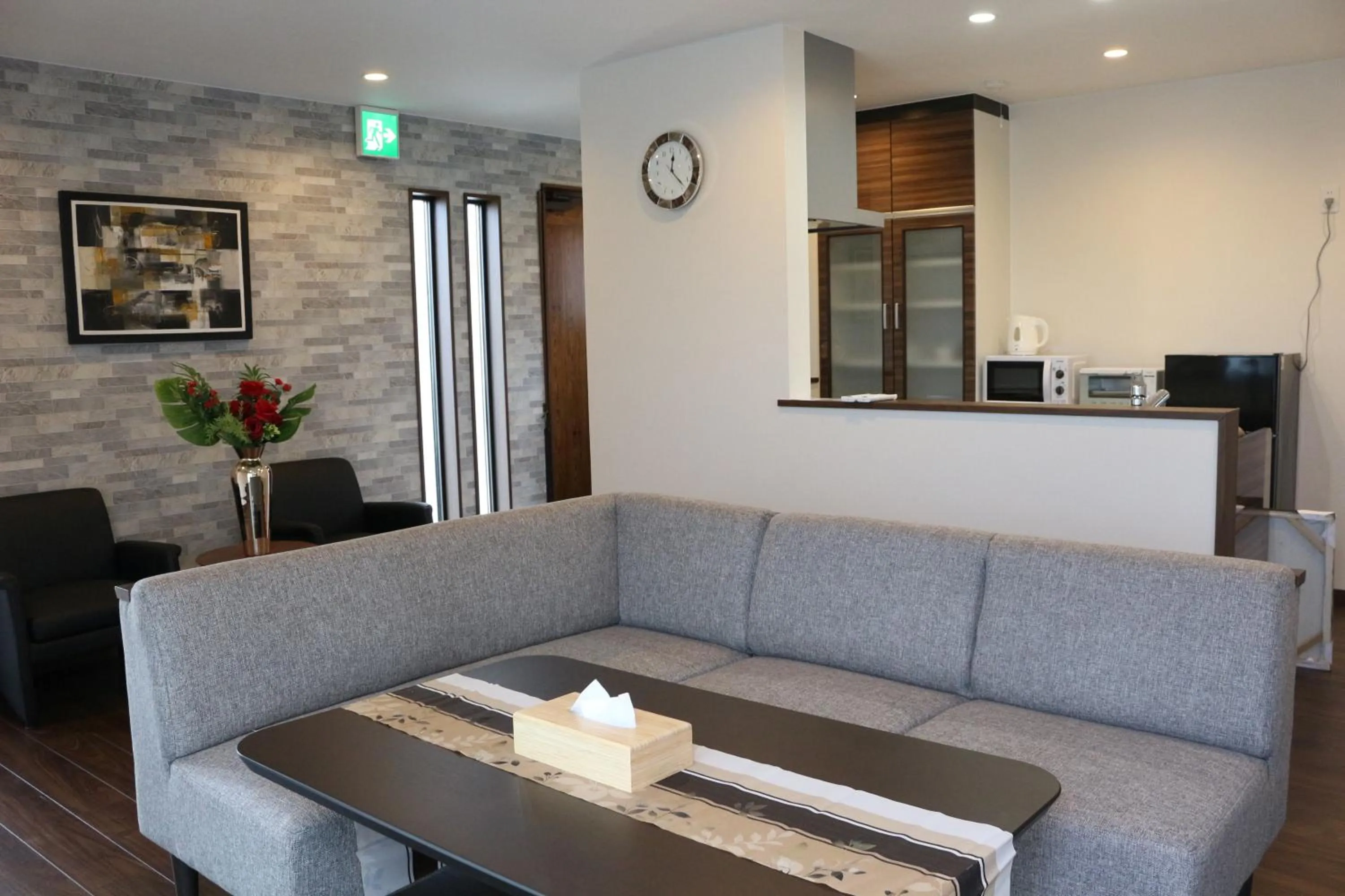 Living room in E-horizon Resort コンドミニアム名護D