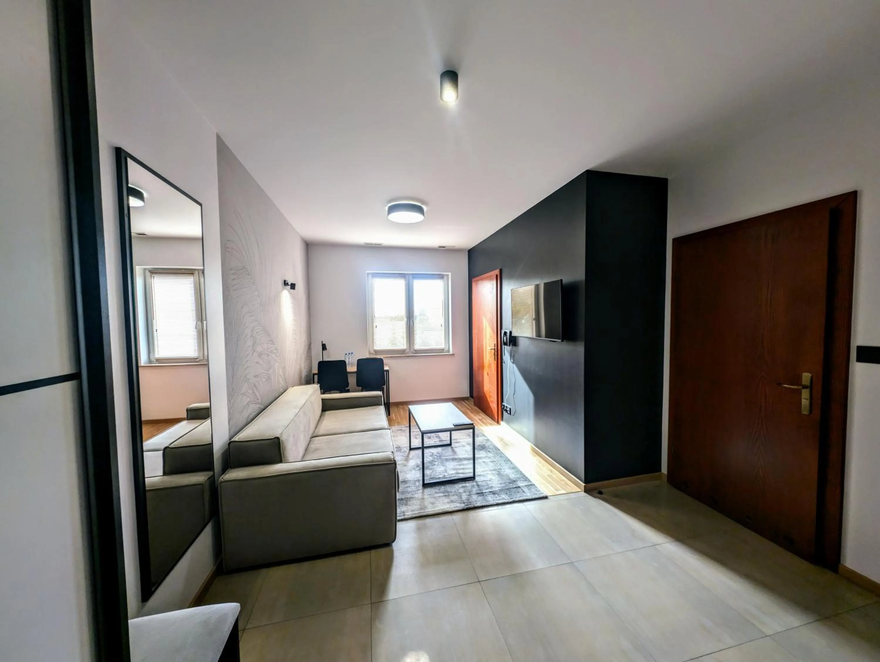 Living room, Bed in Hotel Reśliński