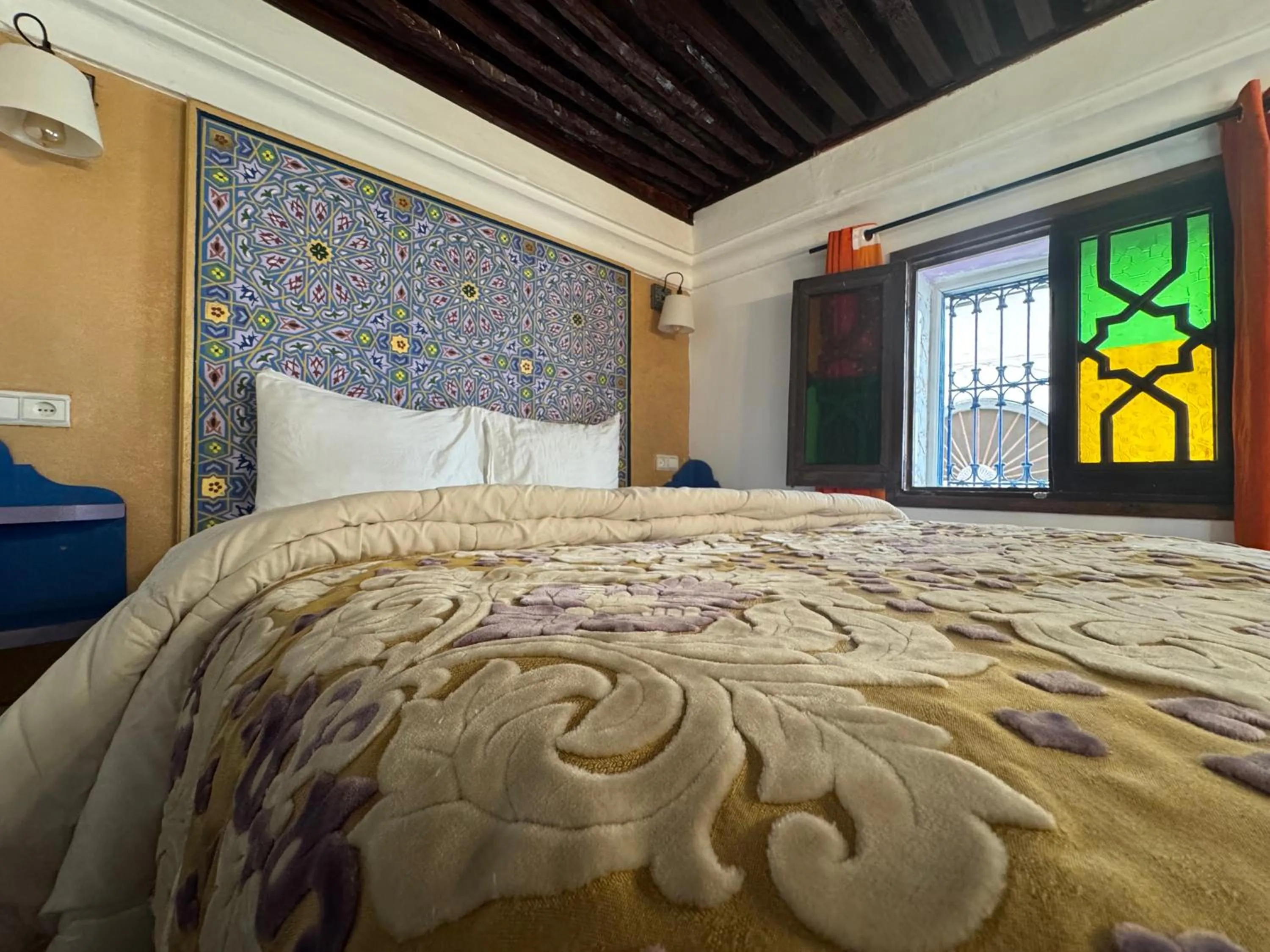 Bed in RIAD ESMERALDA By Dar Ouezzani