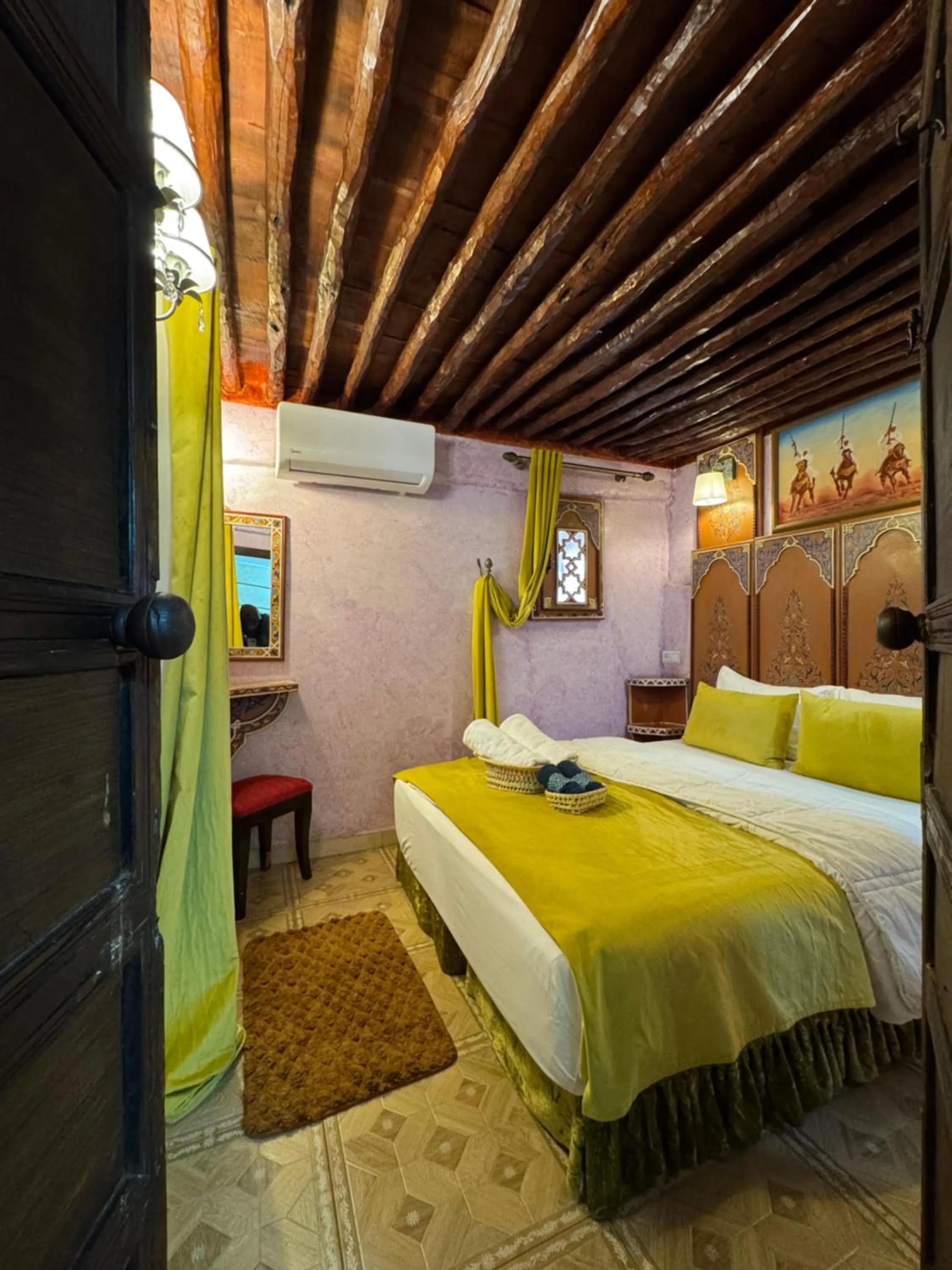 Bed in RIAD ESMERALDA By Dar Ouezzani
