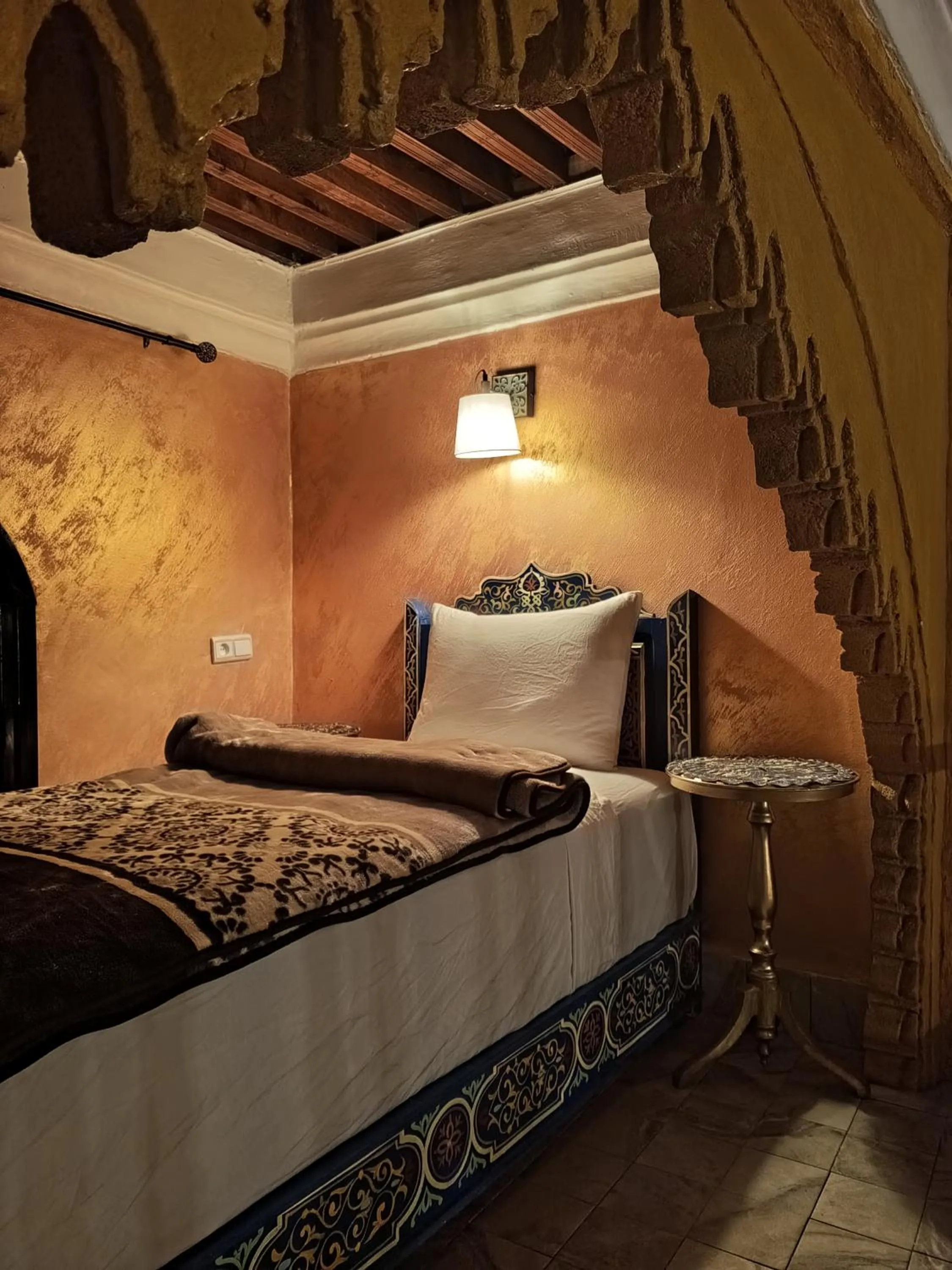 Bed in RIAD ESMERALDA By Dar Ouezzani