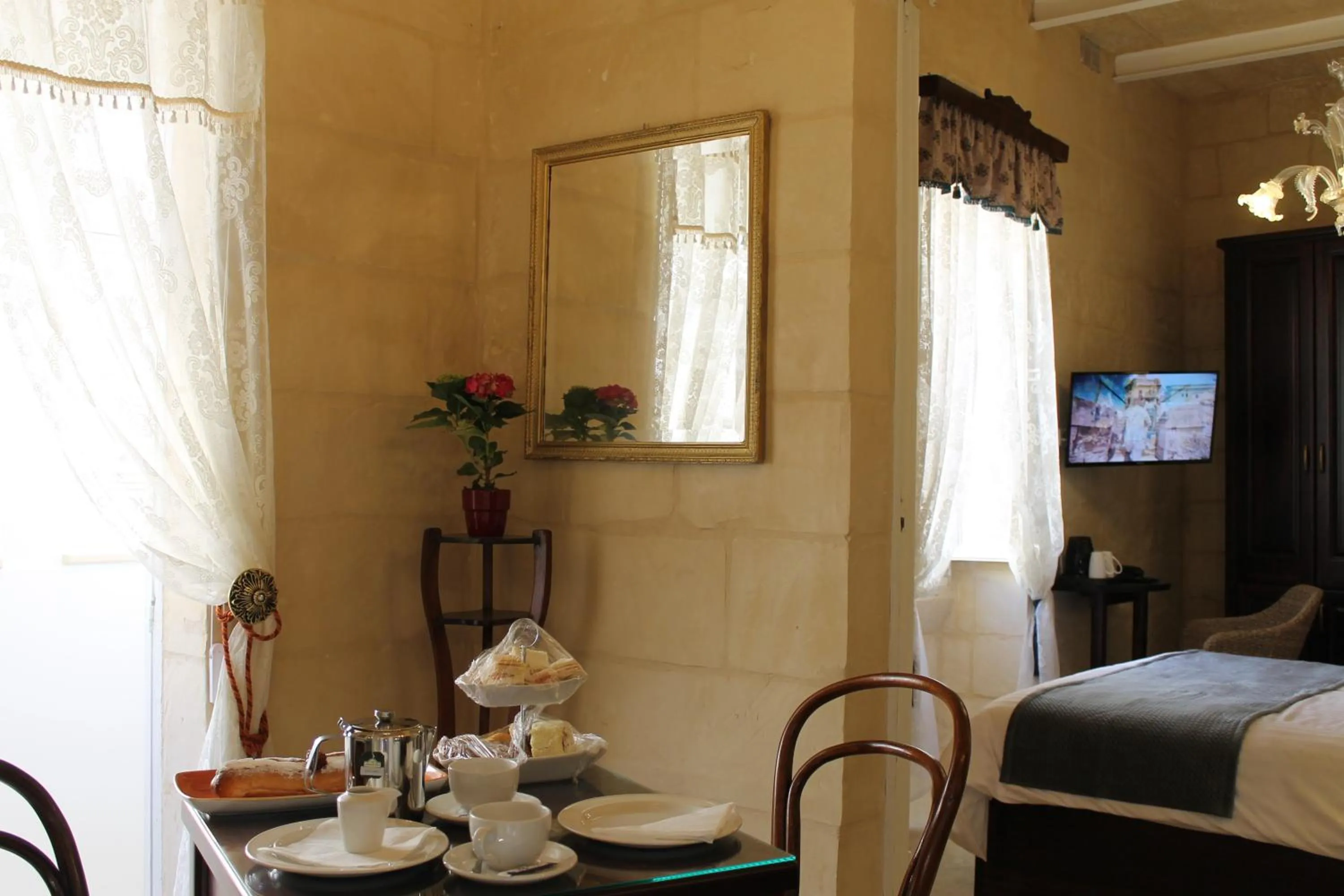 Seating area, Bed in Palazzino Nina Boutique Hotel