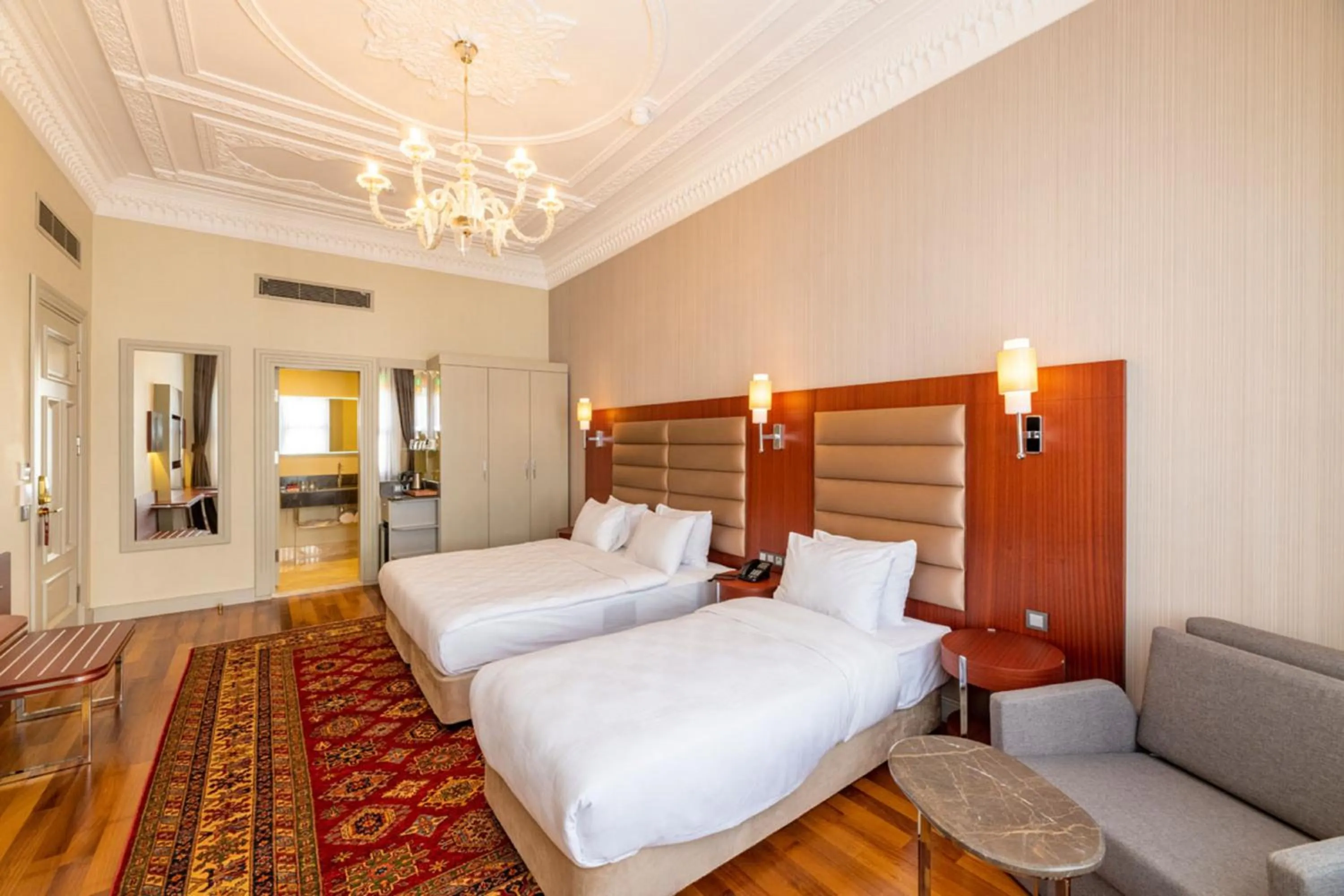 Bed in Blue Gilroy Hotel