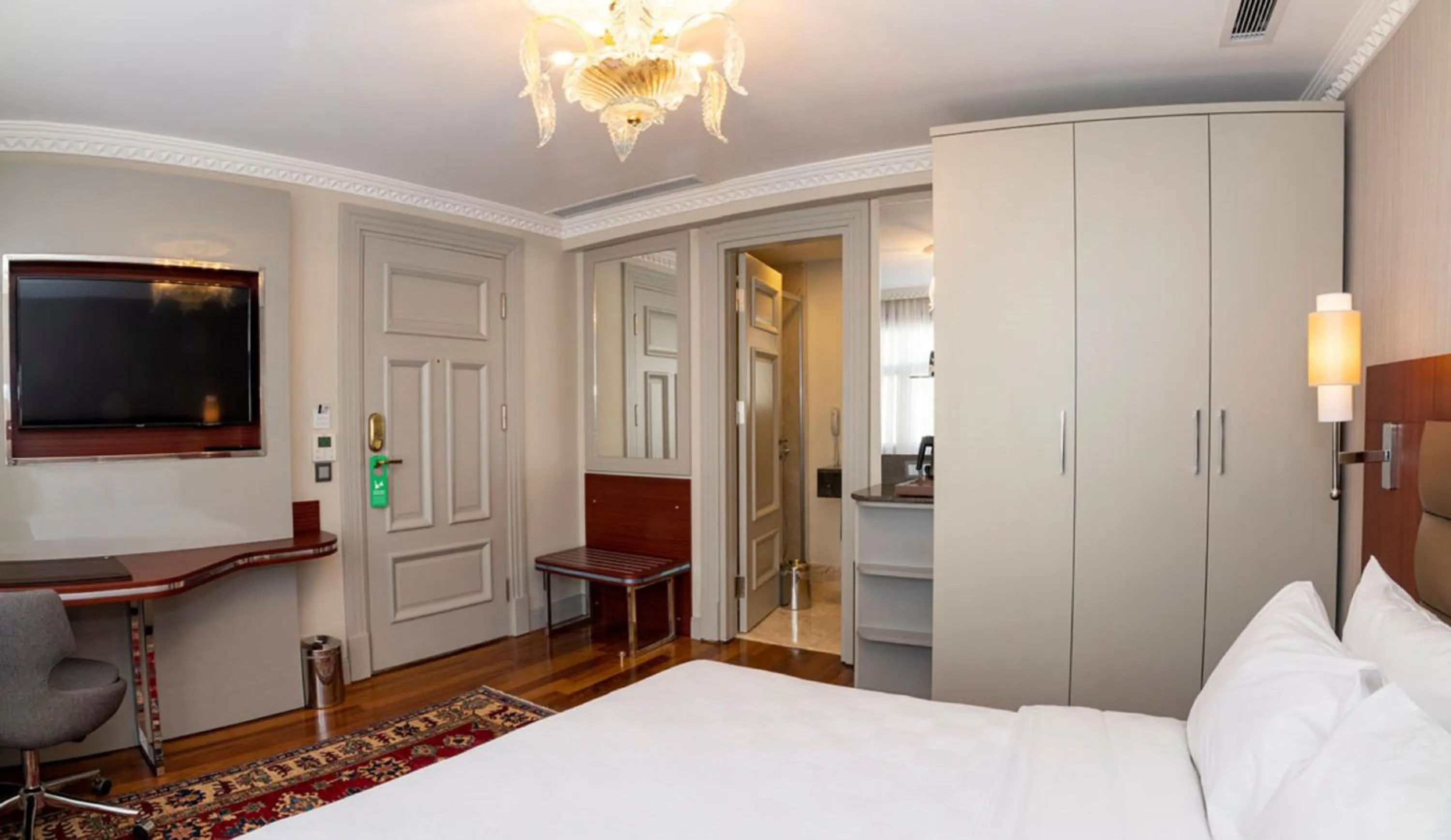 Bed in Blue Gilroy Hotel