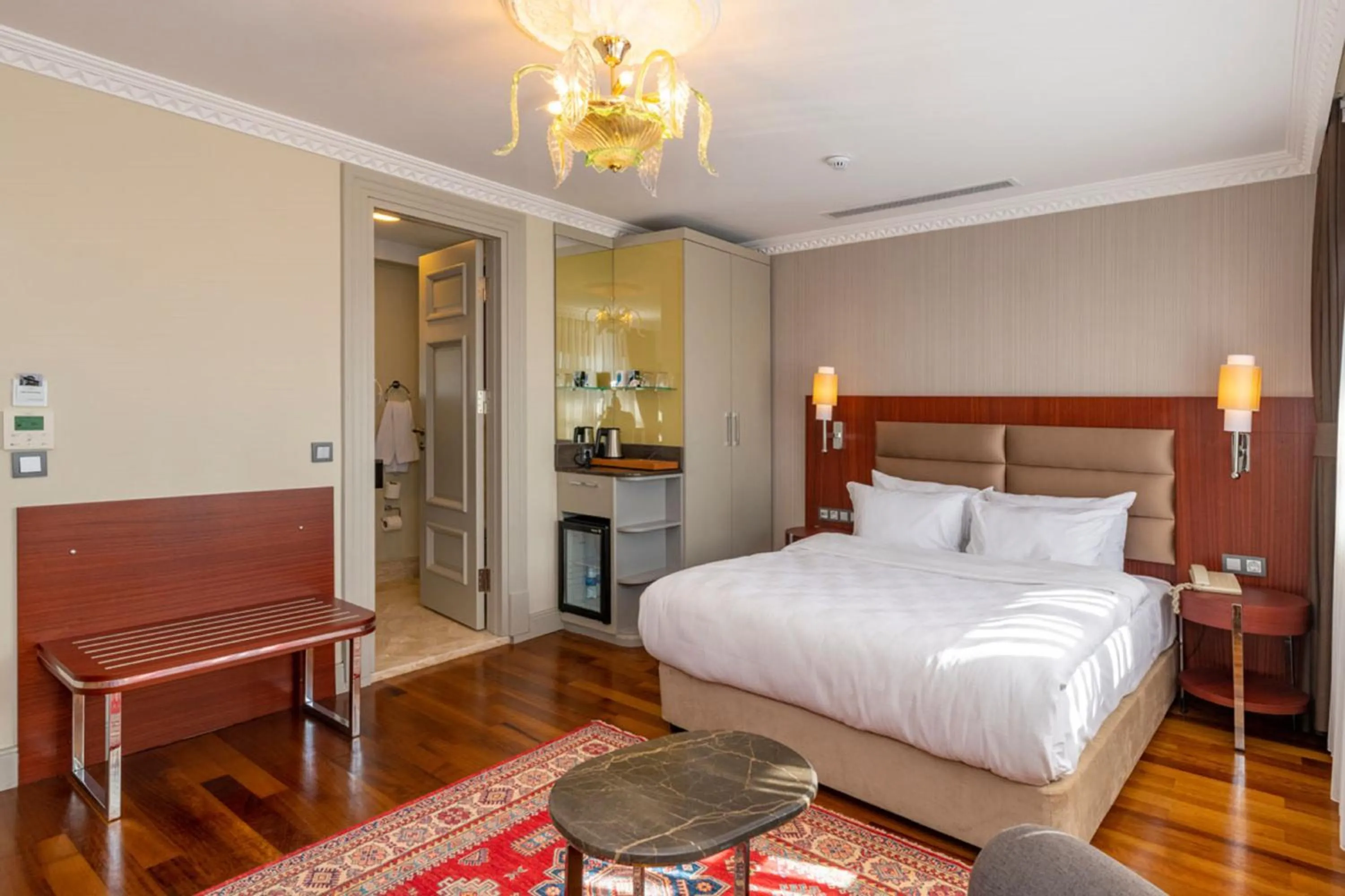 Bed in Blue Gilroy Hotel