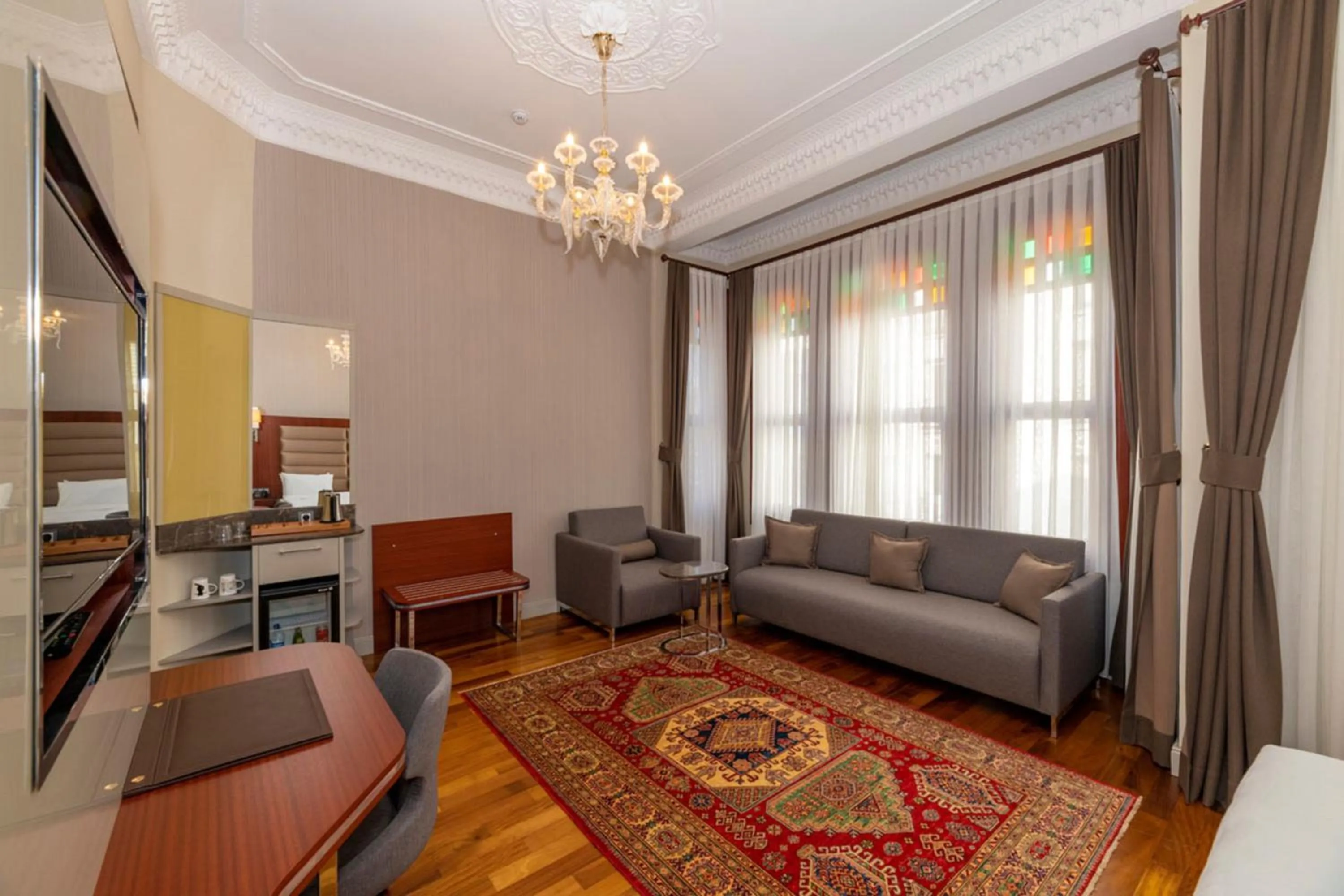 Bed in Blue Gilroy Hotel